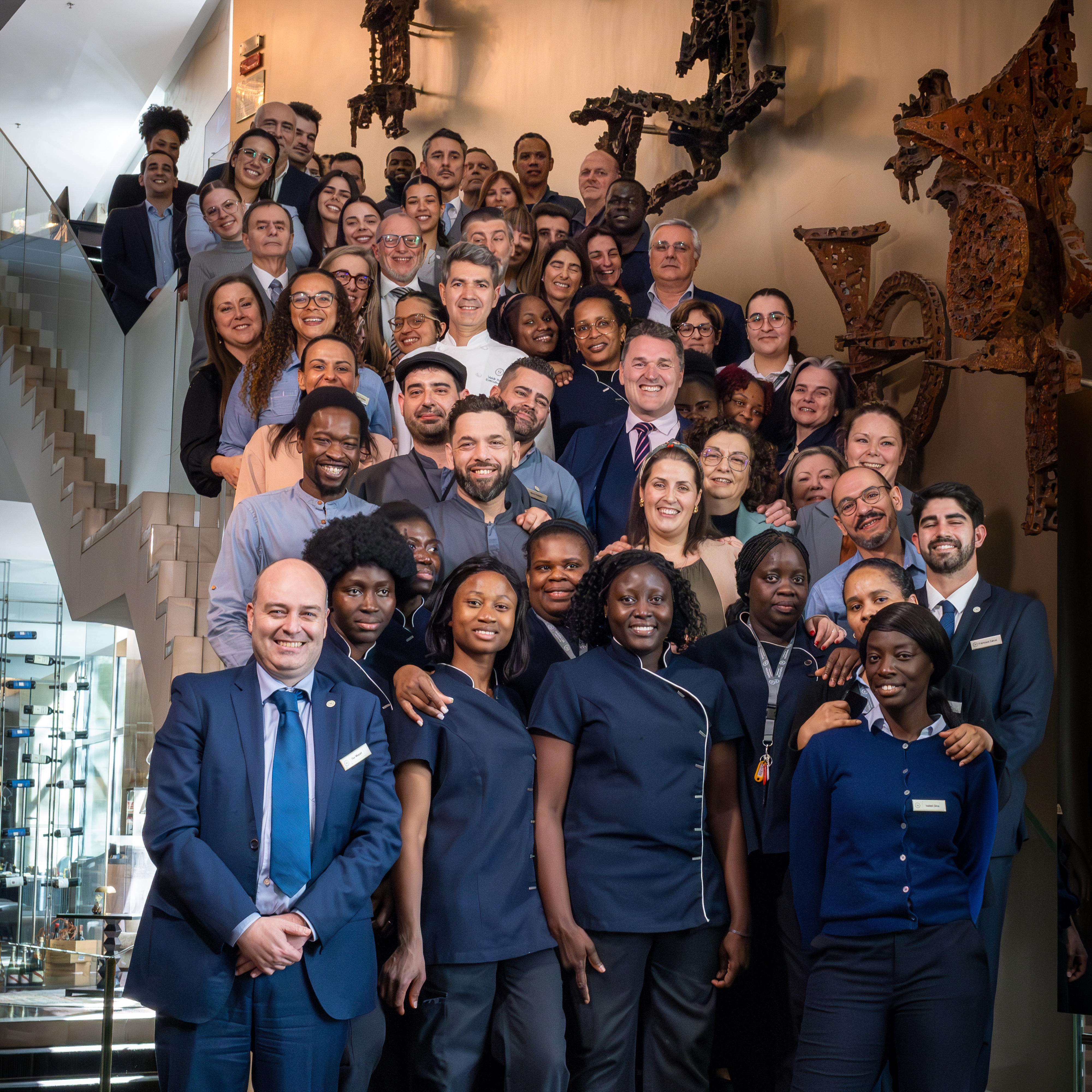 Sheraton Lisboa Hotel group photo on staircase