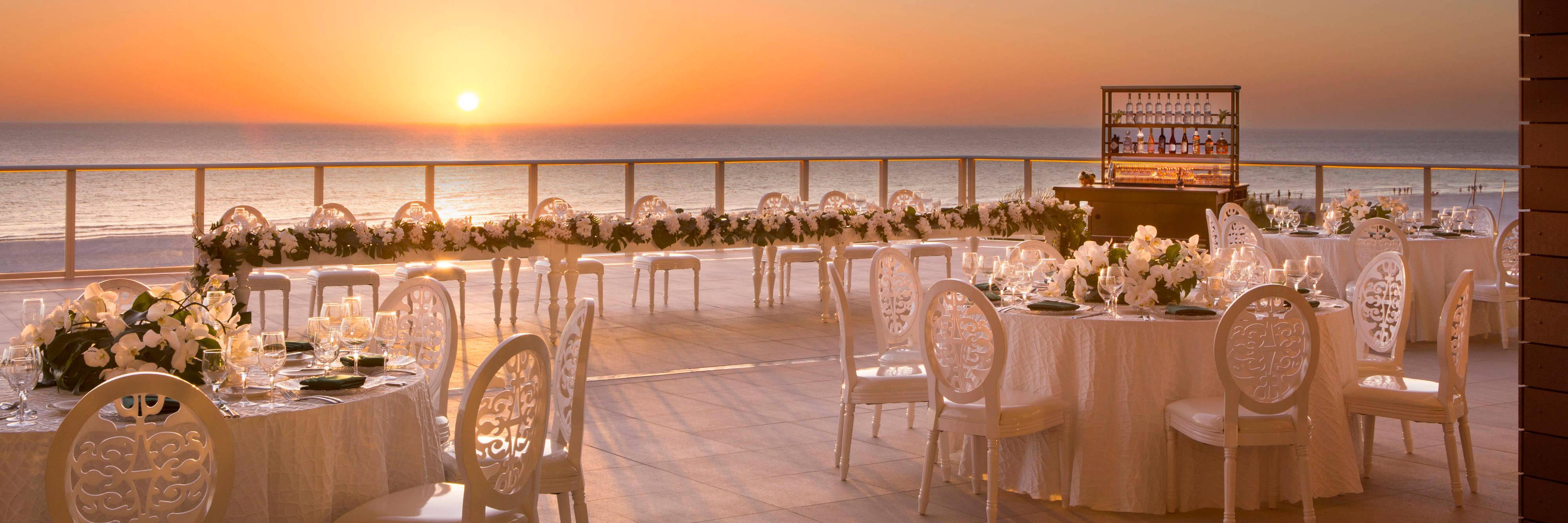 Terrace wedding reception at sunset