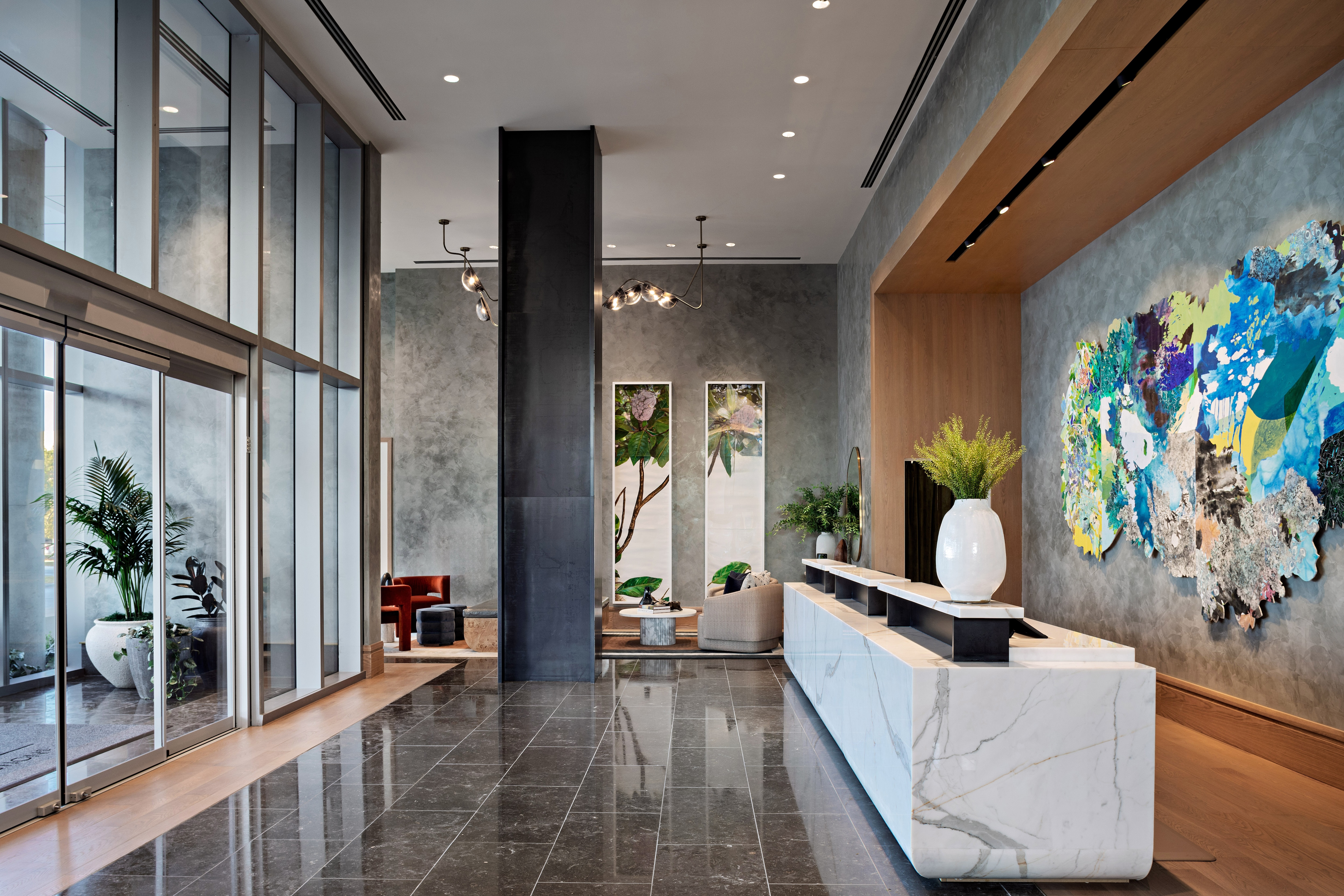 Modern lobby with artwork and a seating area