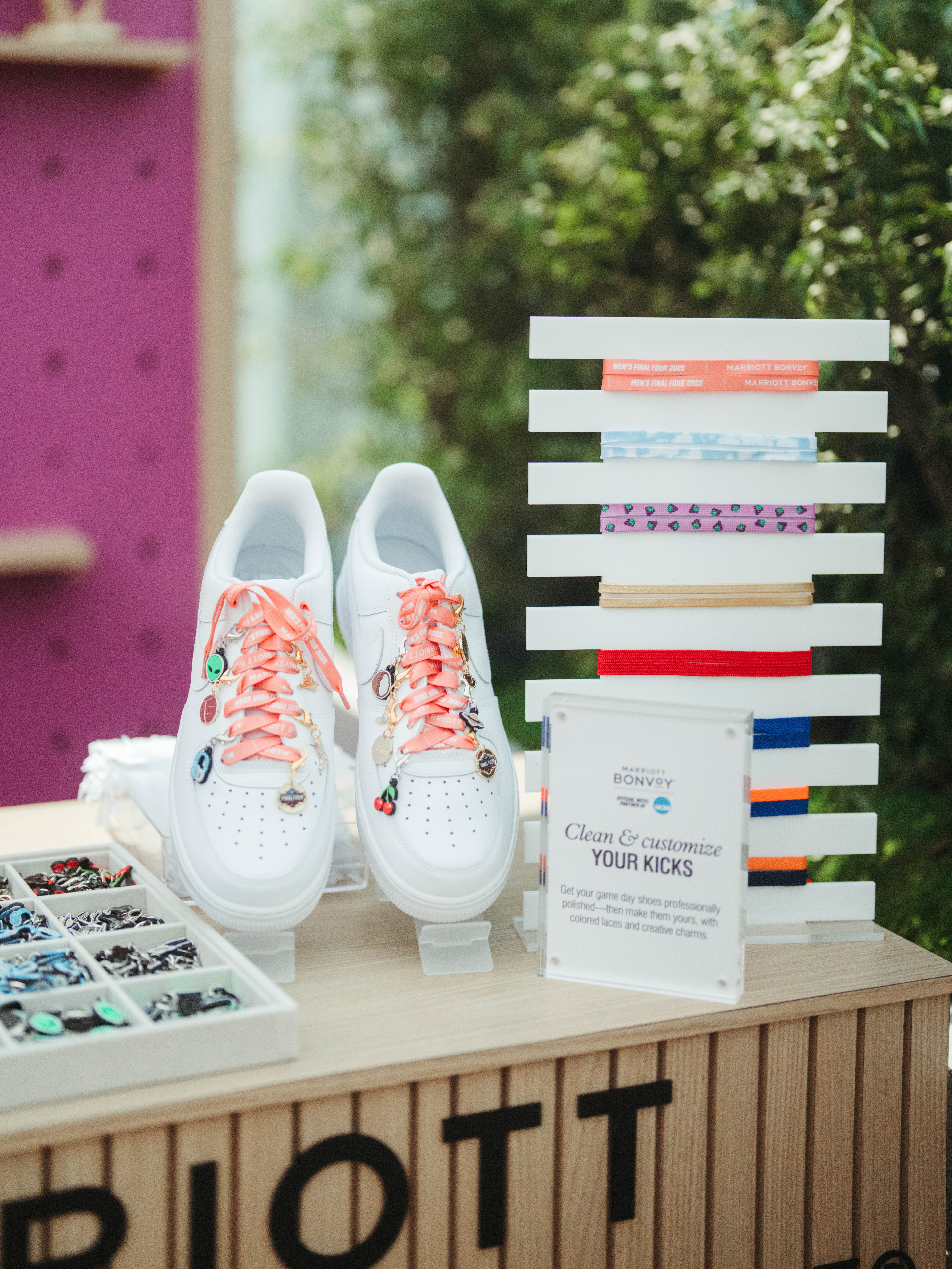 Sneaker charms on a stand at the NCAA booth