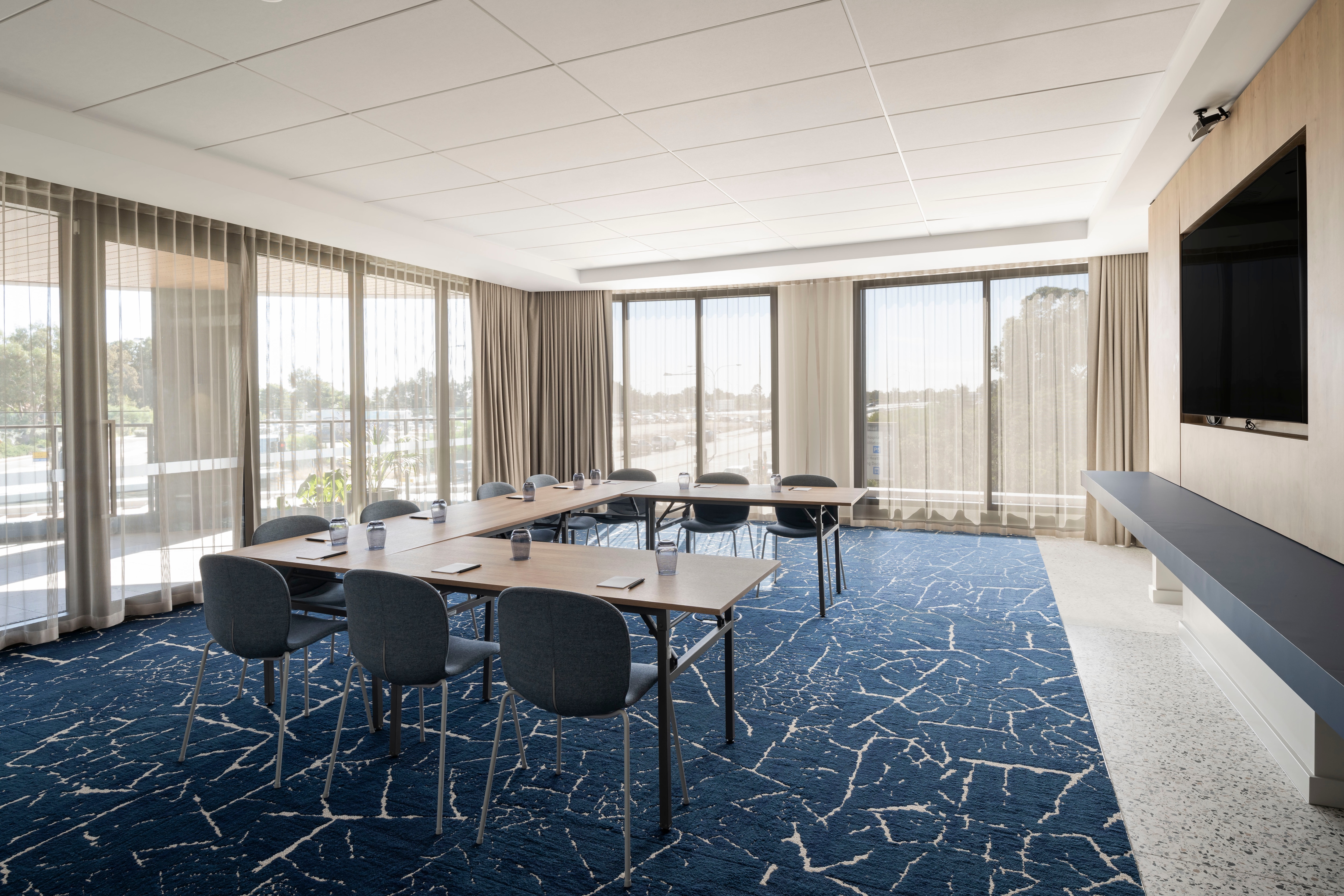 Meeting space with floor-to-ceiling windows