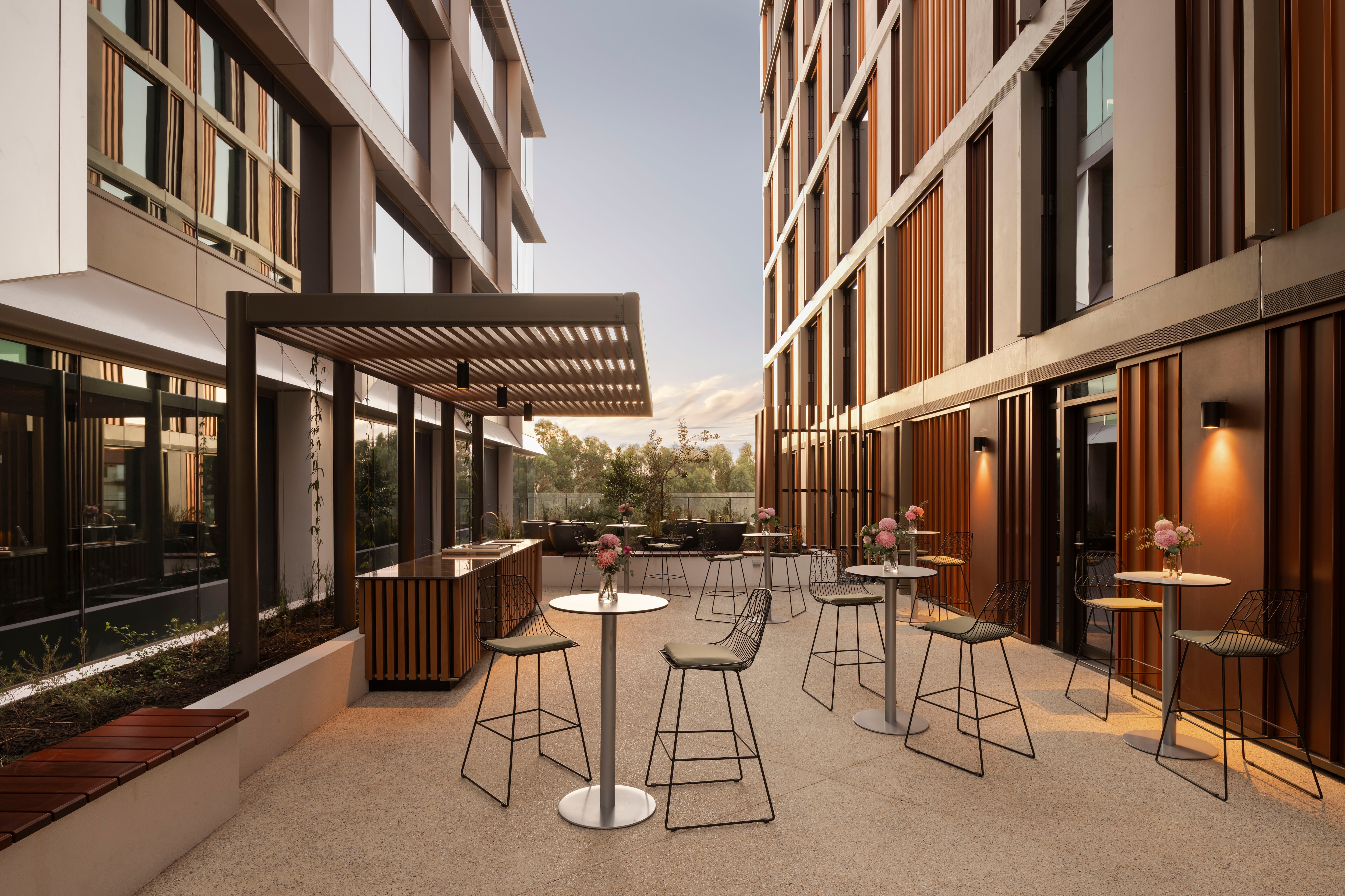 Outdoor terrace with urban and green views