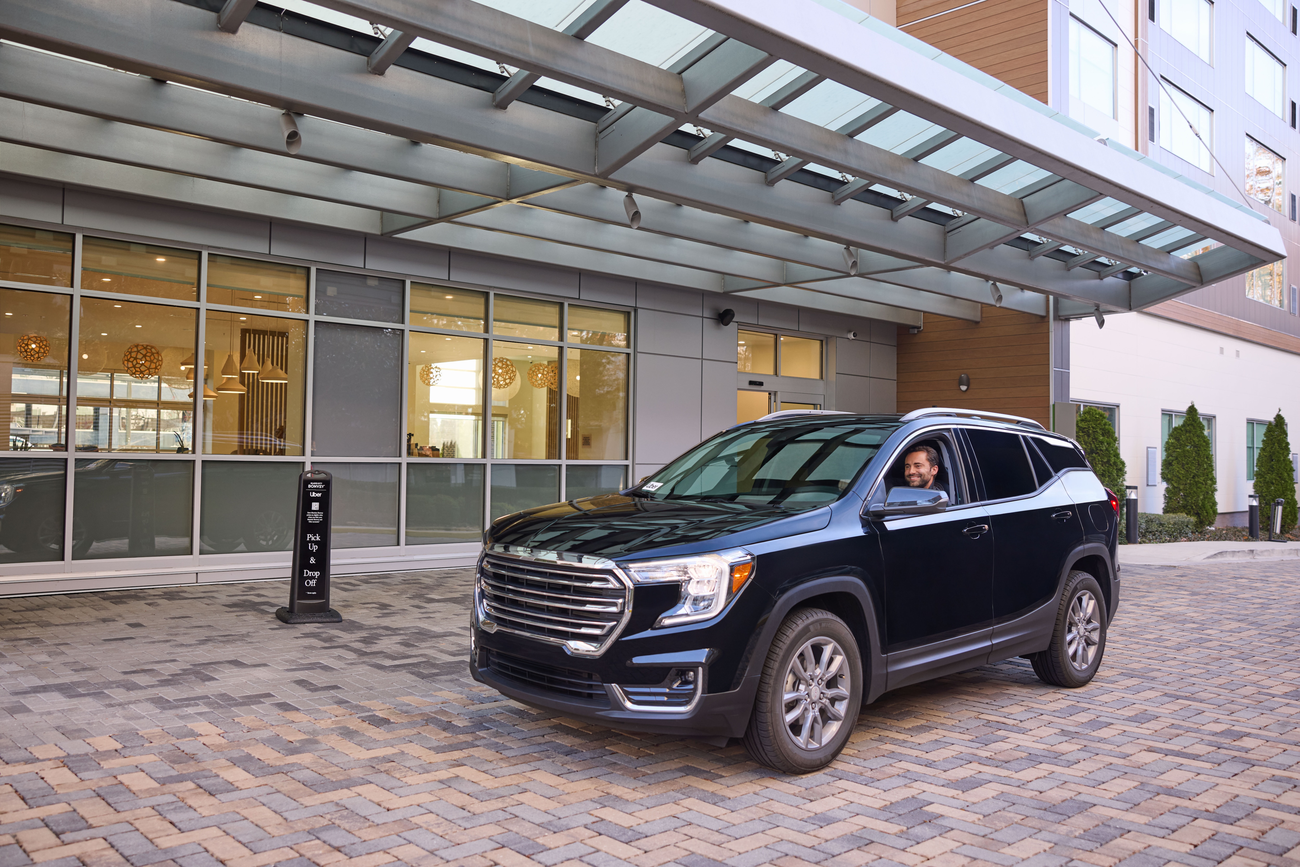 Waiting for Uber pickup outside hotel