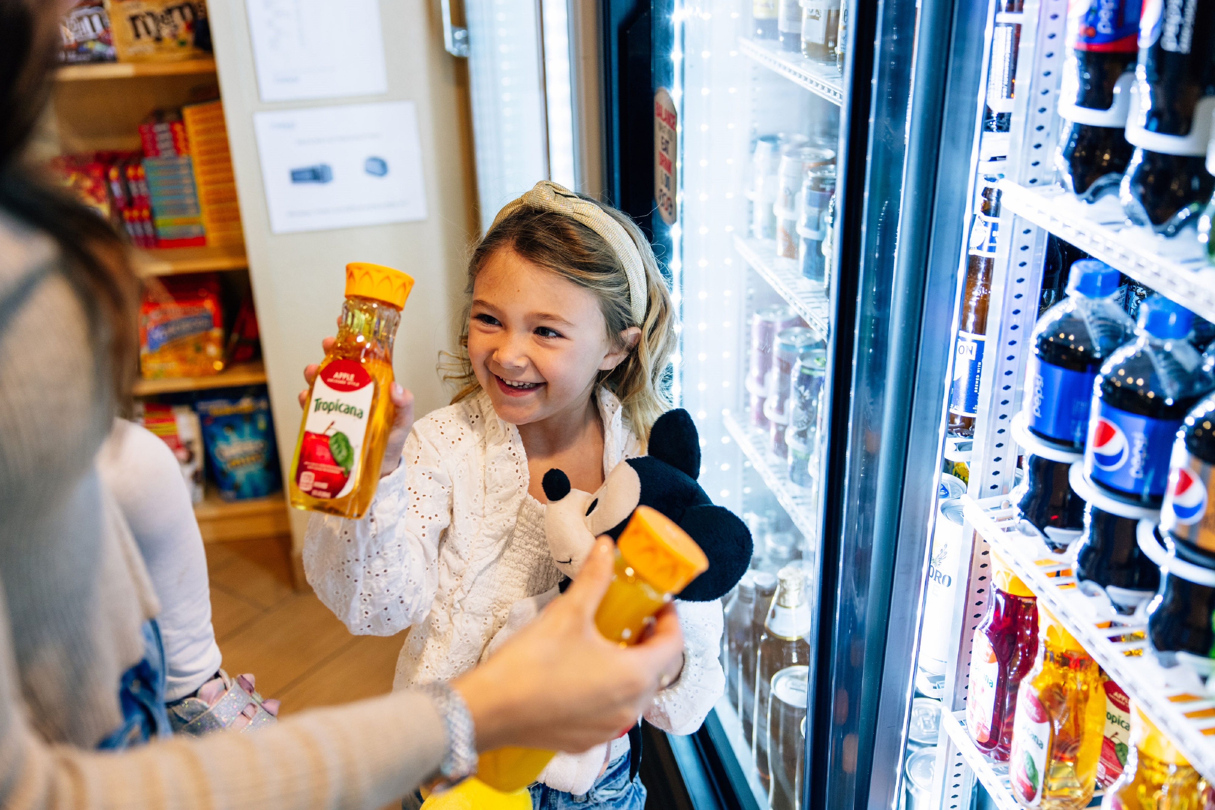 Child holding a juice bottle