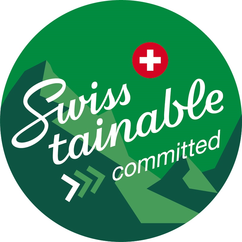 green logo, white text and red cross