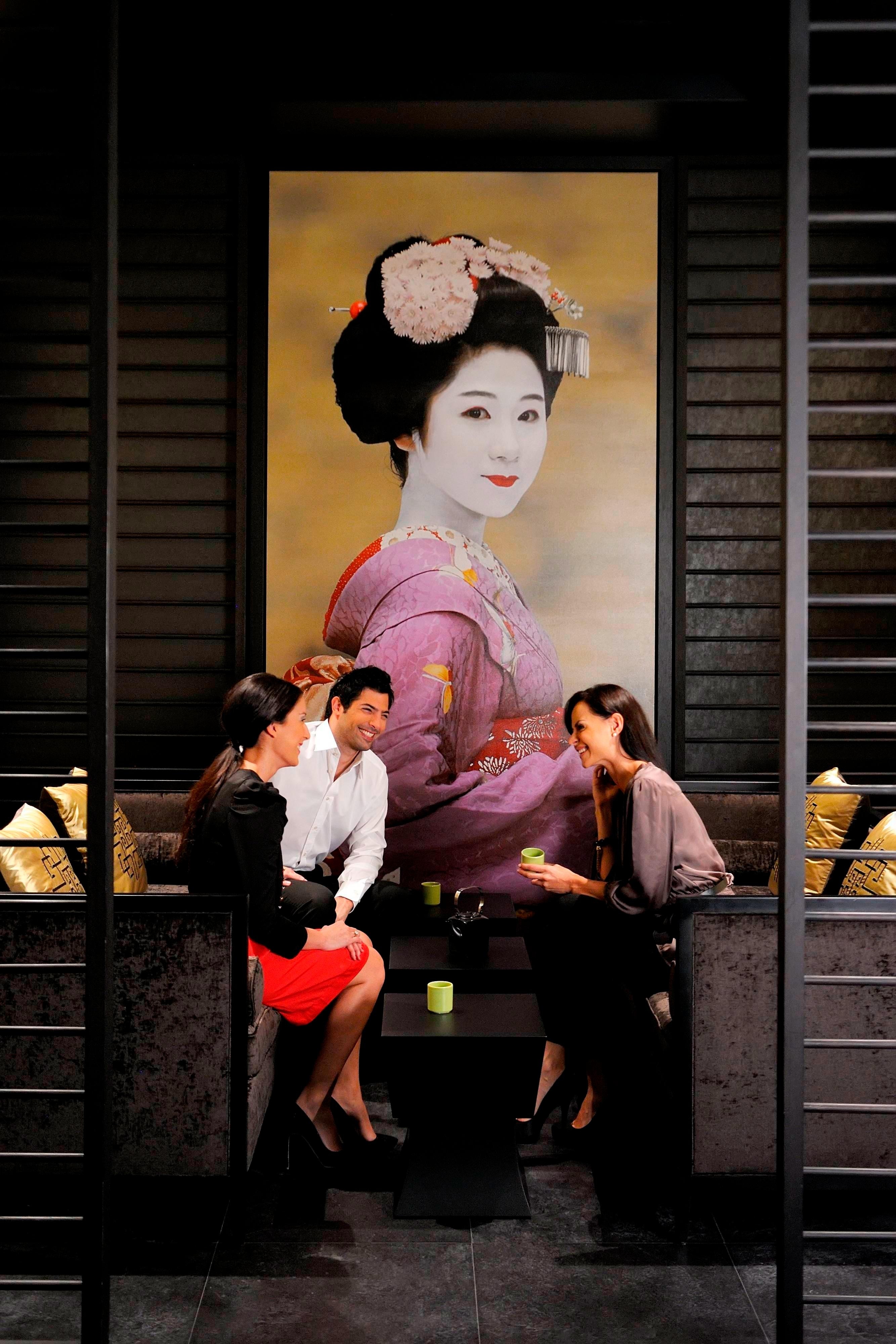 People sitting in a restaurant booth