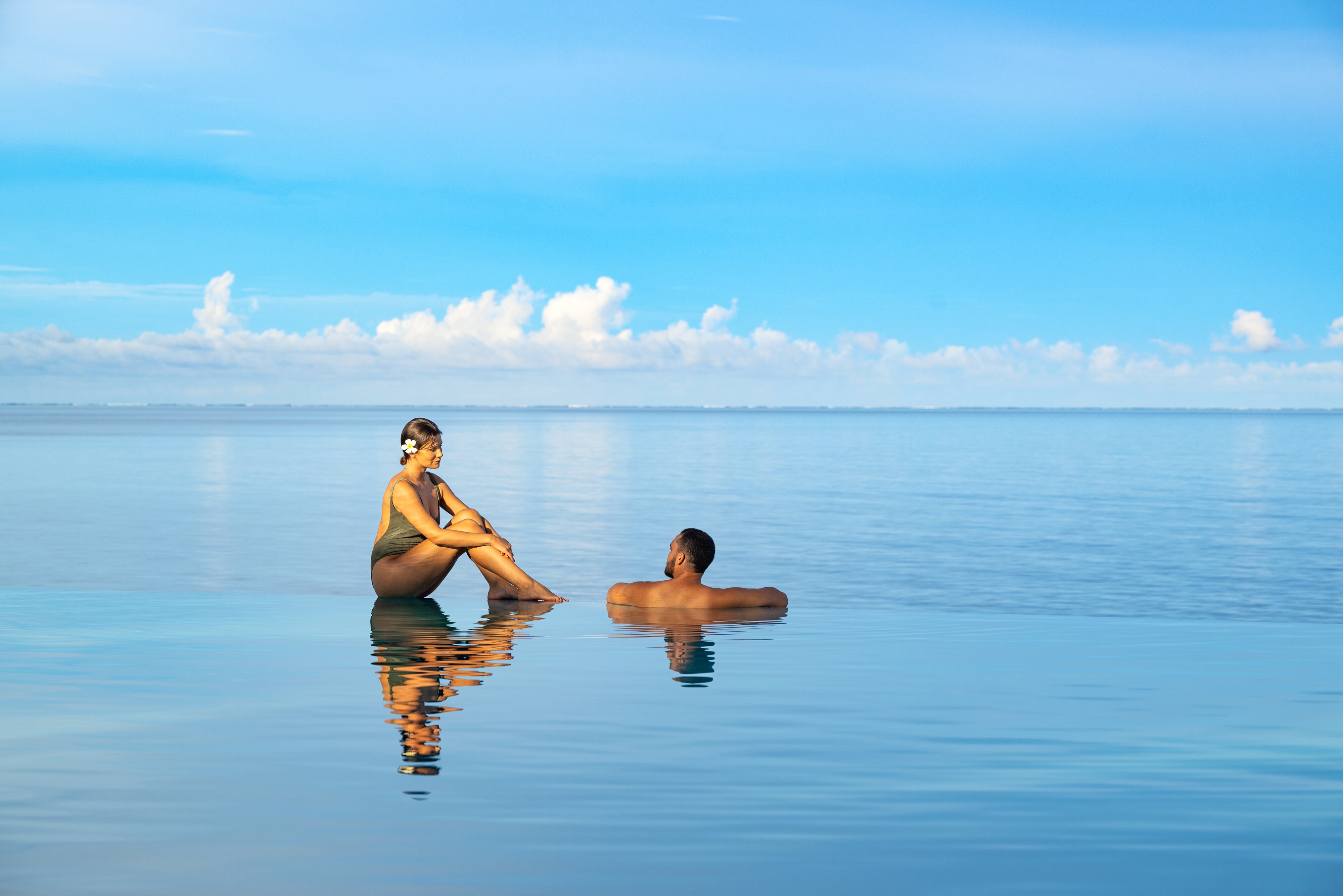 Couple relaxing in the pool