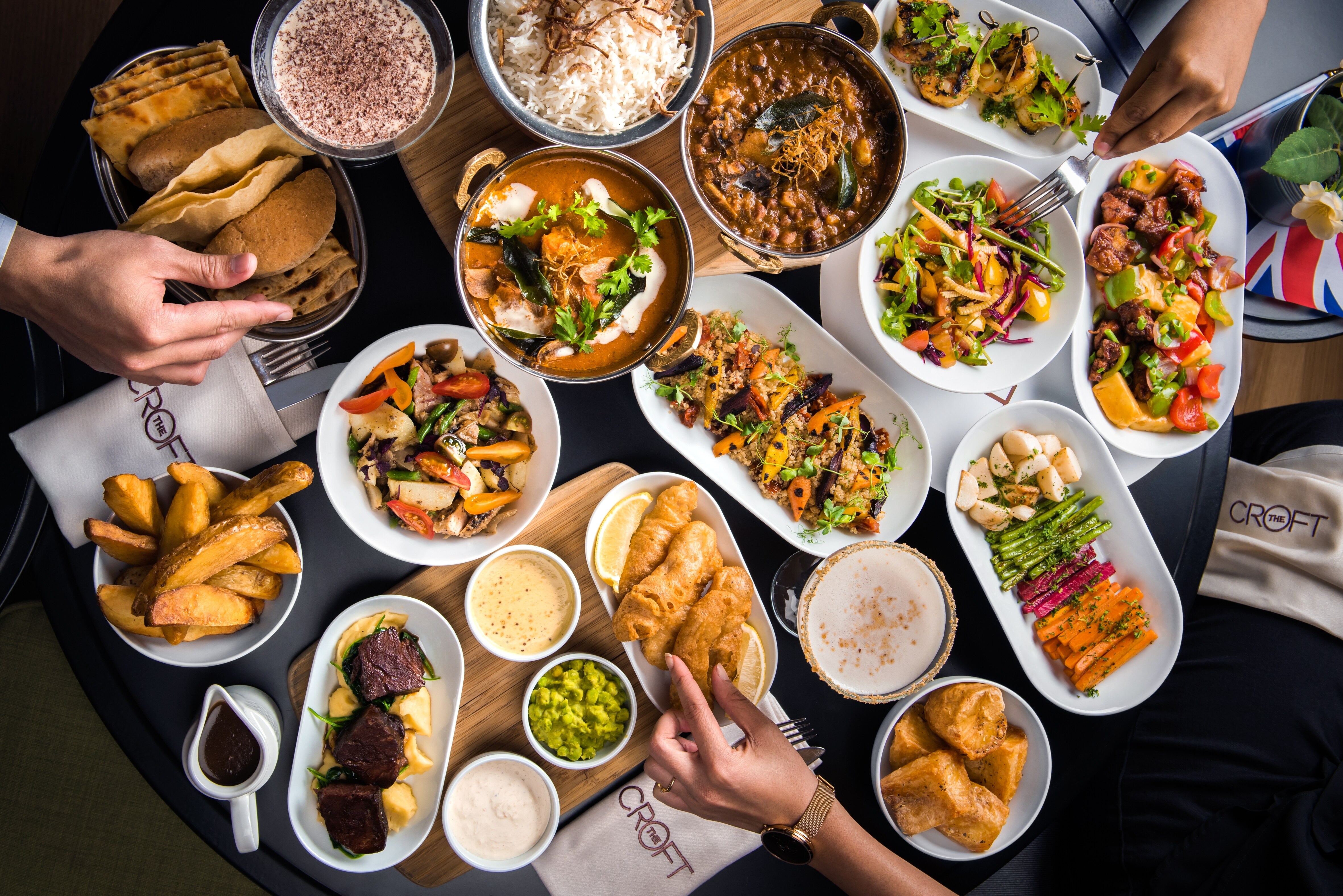 People sharing a meal at a dining table