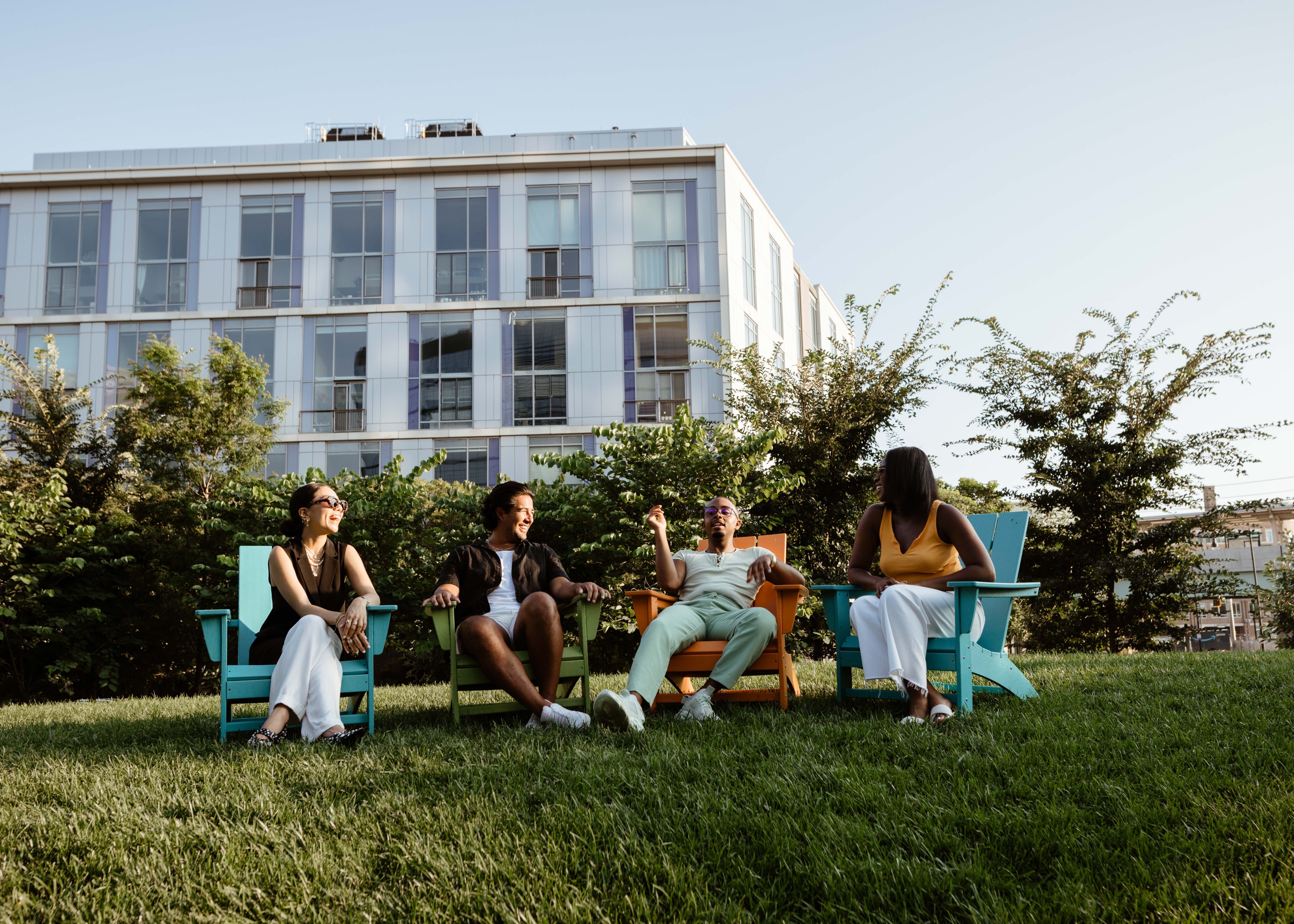 People sitting on lawn chairs