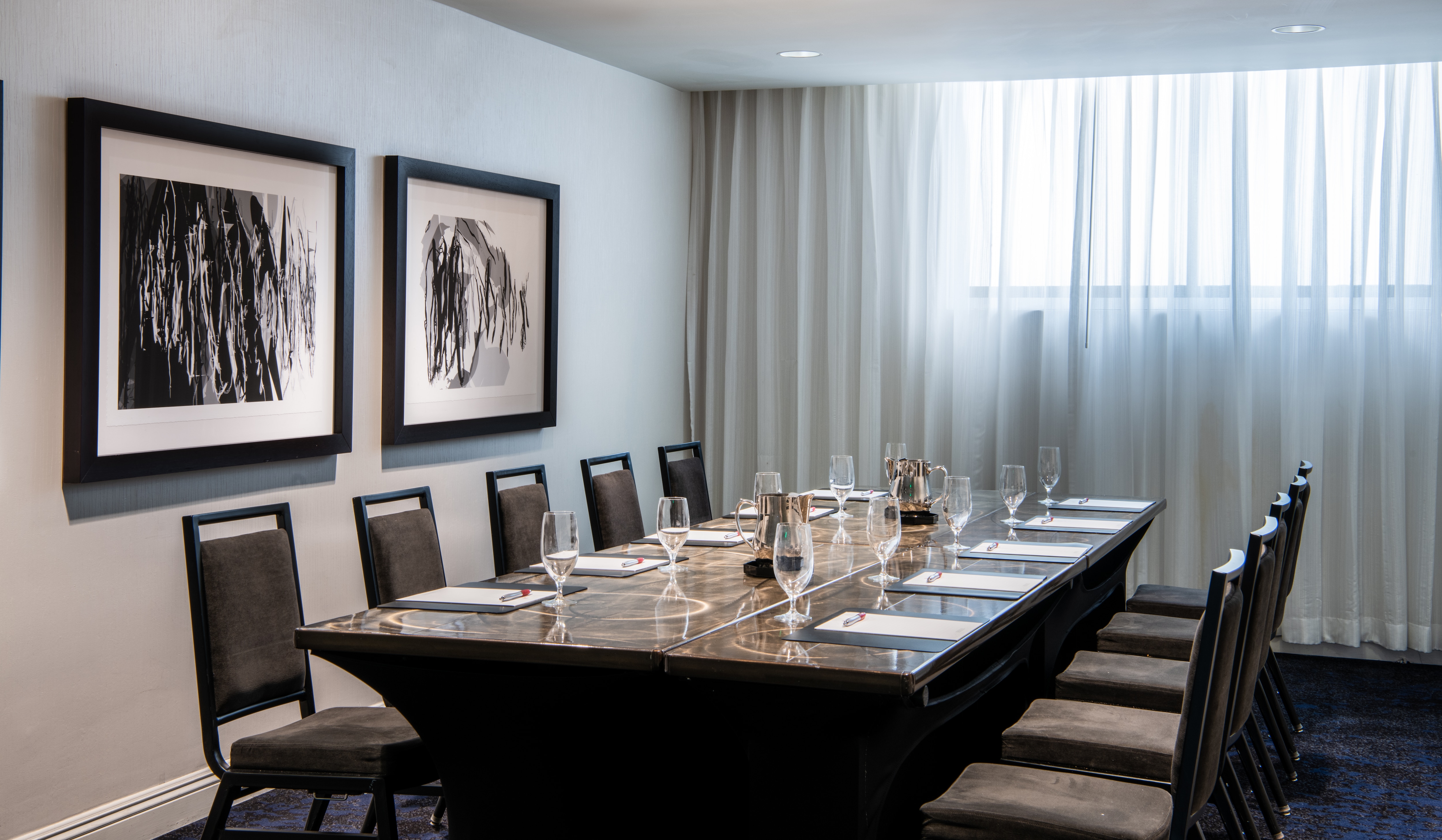 Meeting room with large, rectangular table