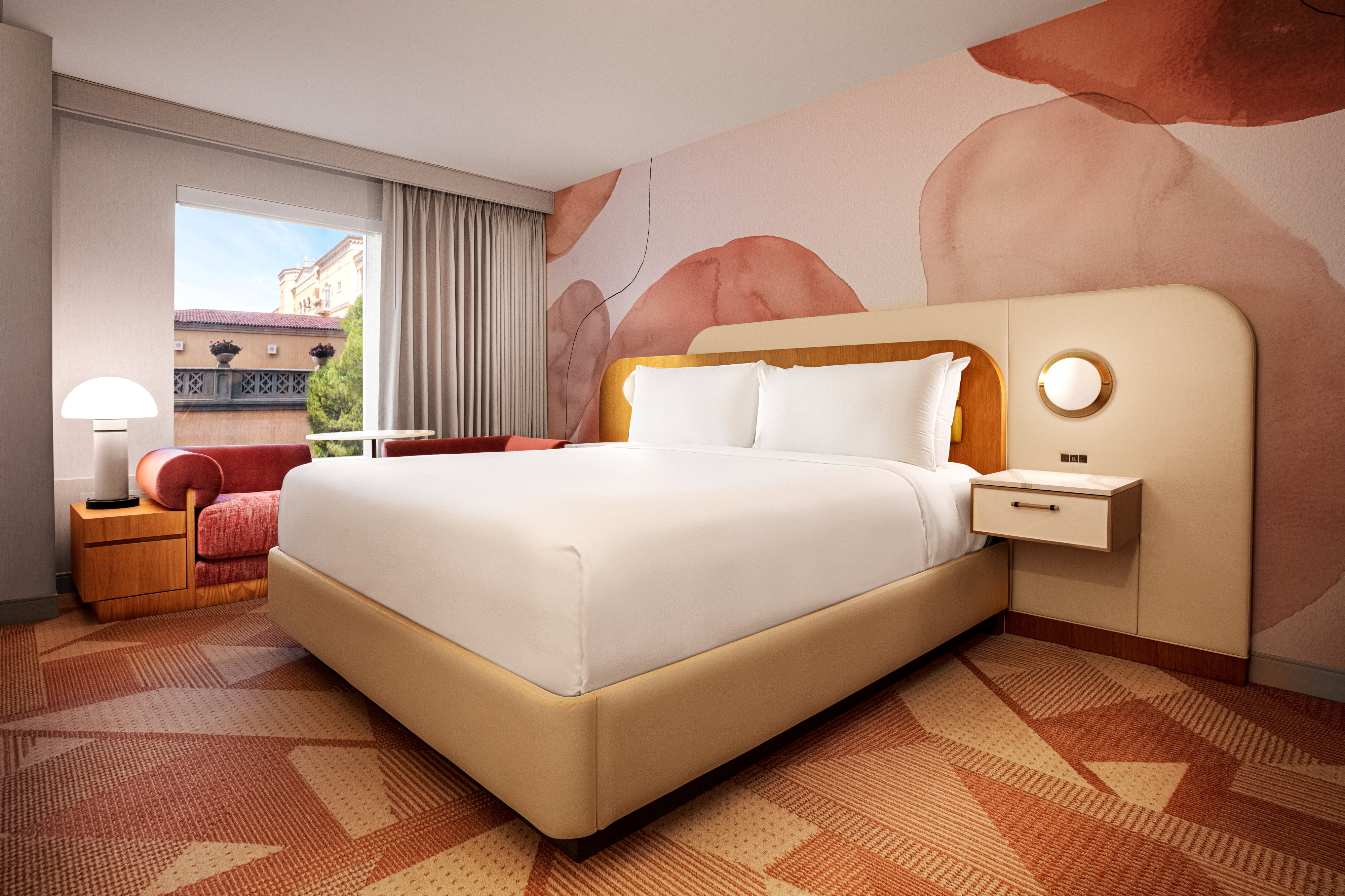 Room with window, lamp, chair, king bed