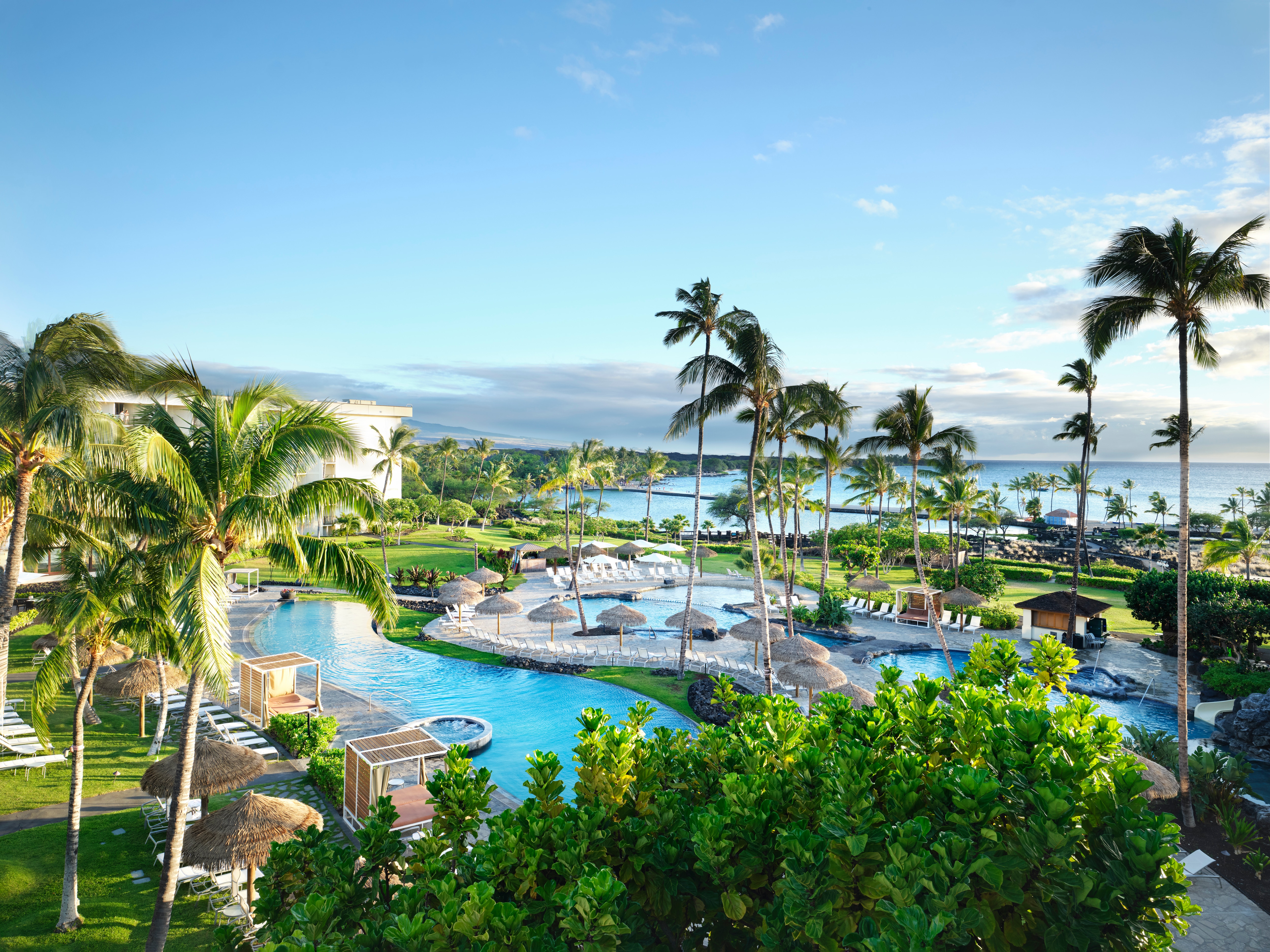 Aerial view of pools, fish ponds, and beach