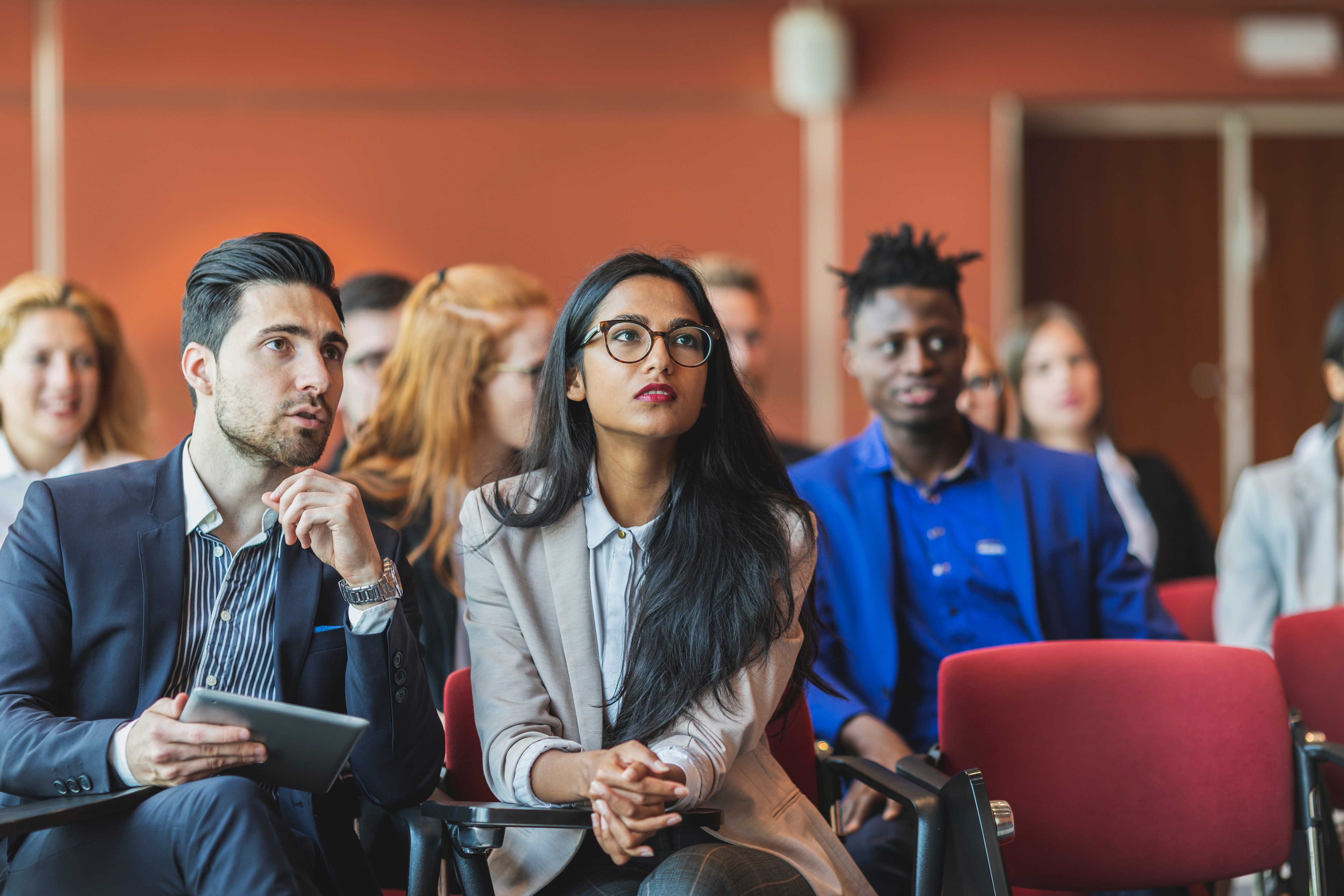 Business people attending a presentation