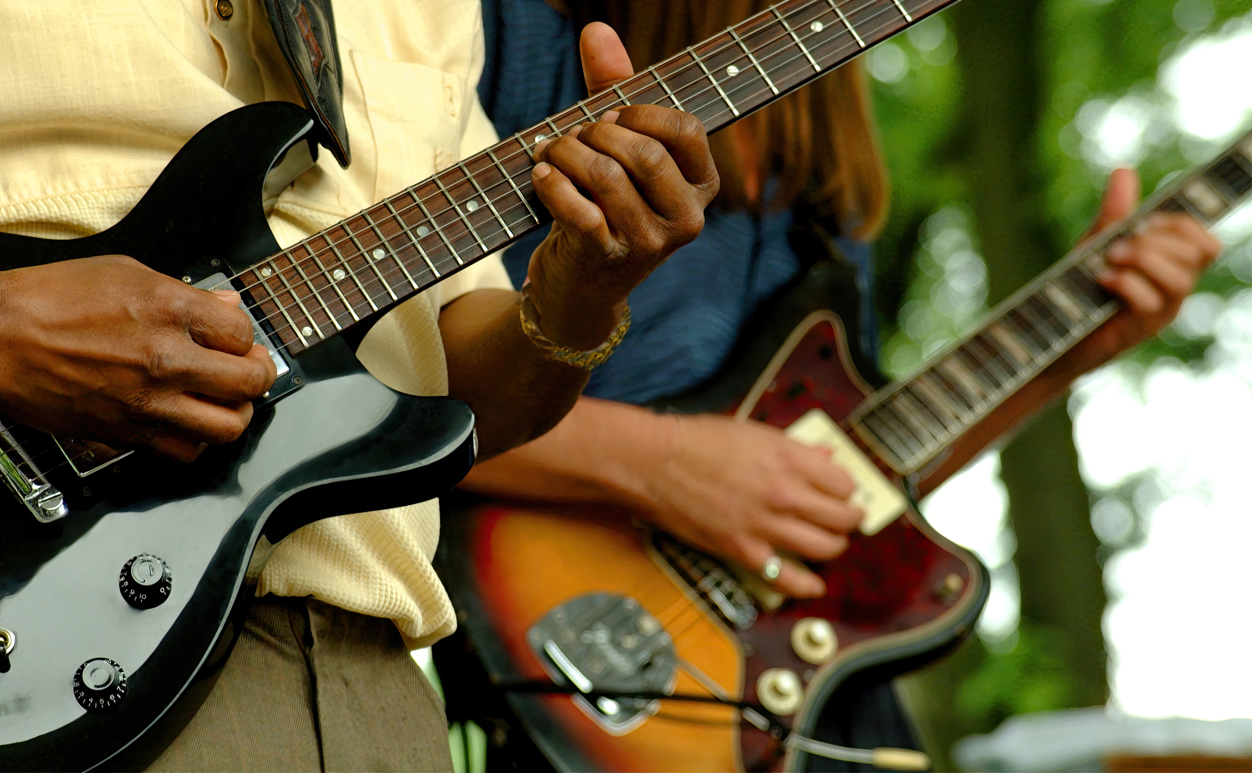 Person Playing Guitar