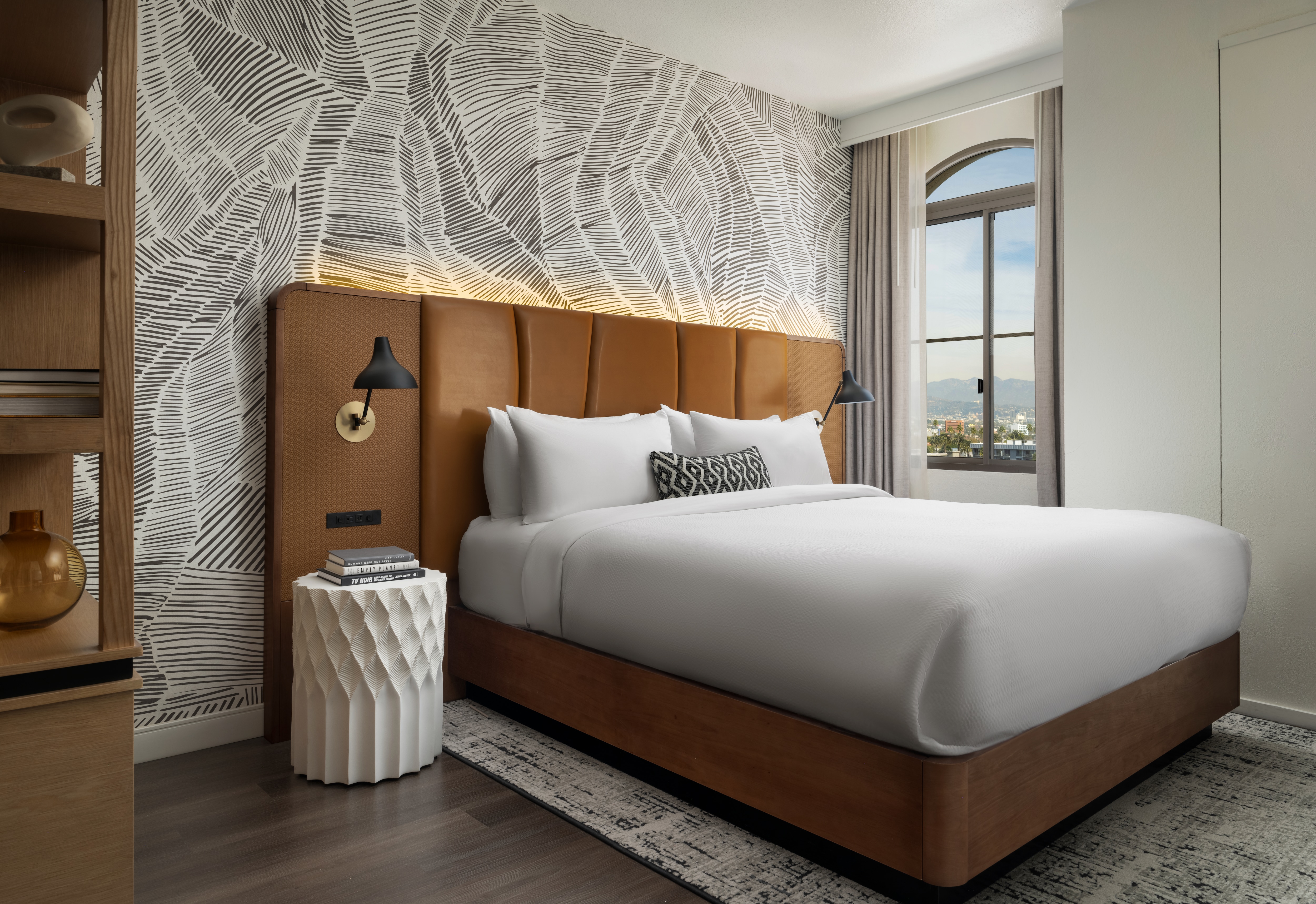 king bed with large upholstered headboard