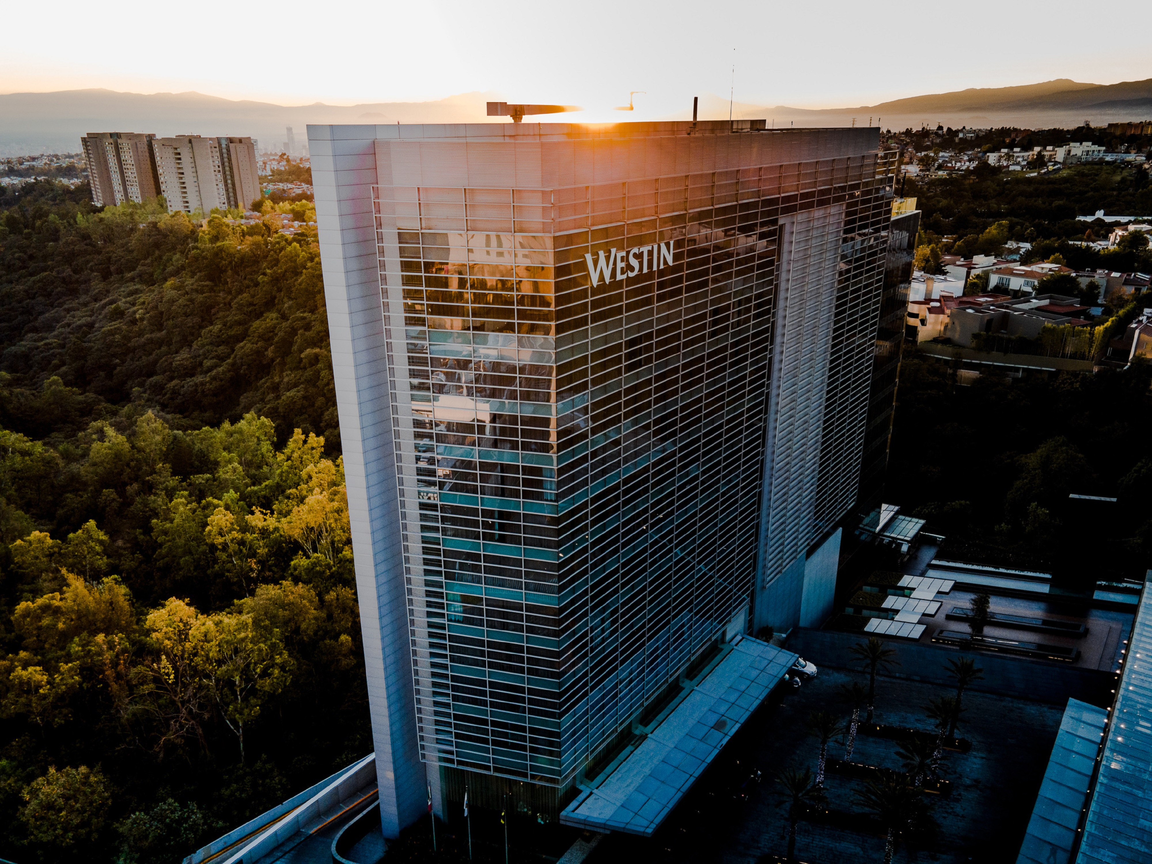 Westin hotel facade at sunset