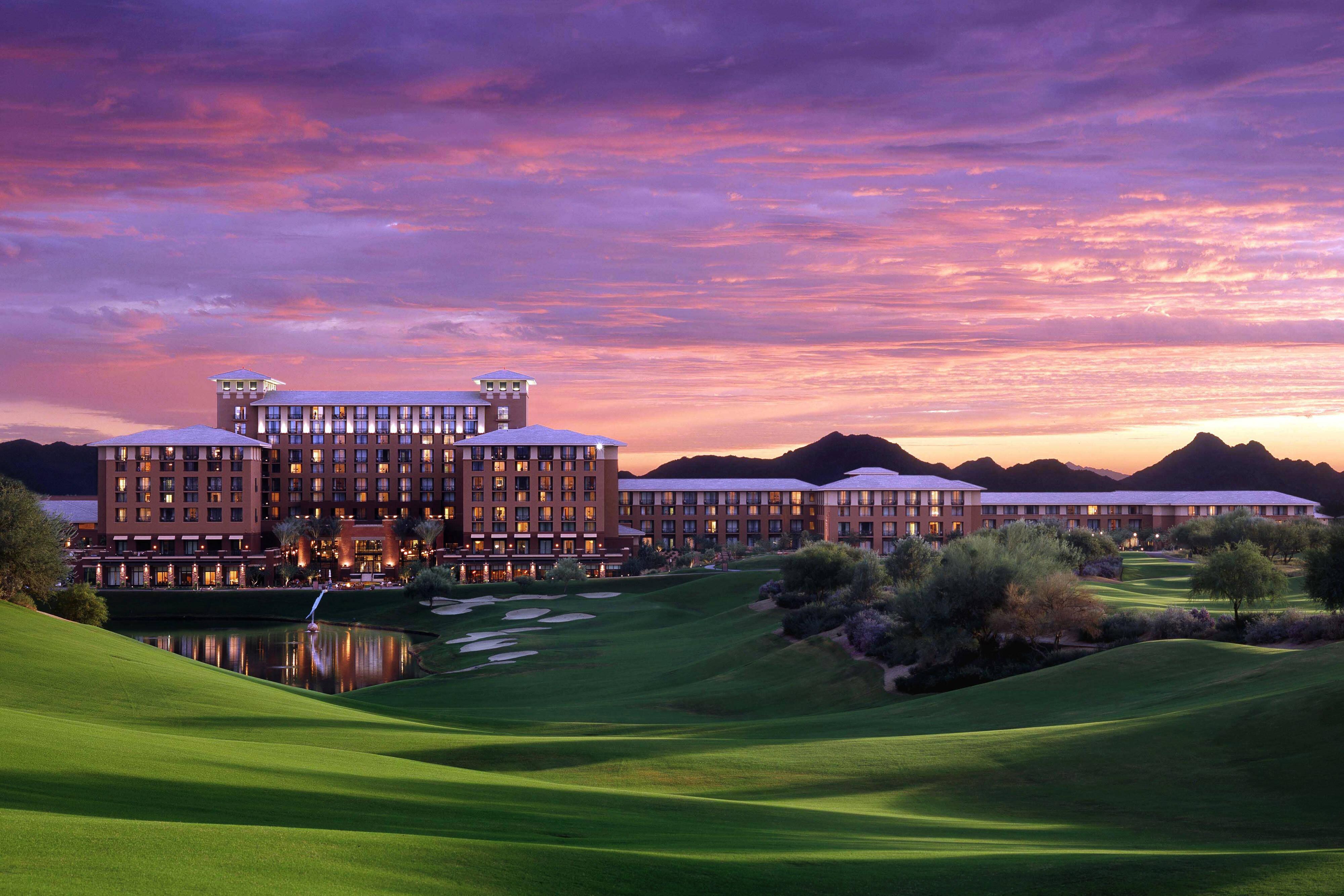 Golf course with hotel in background