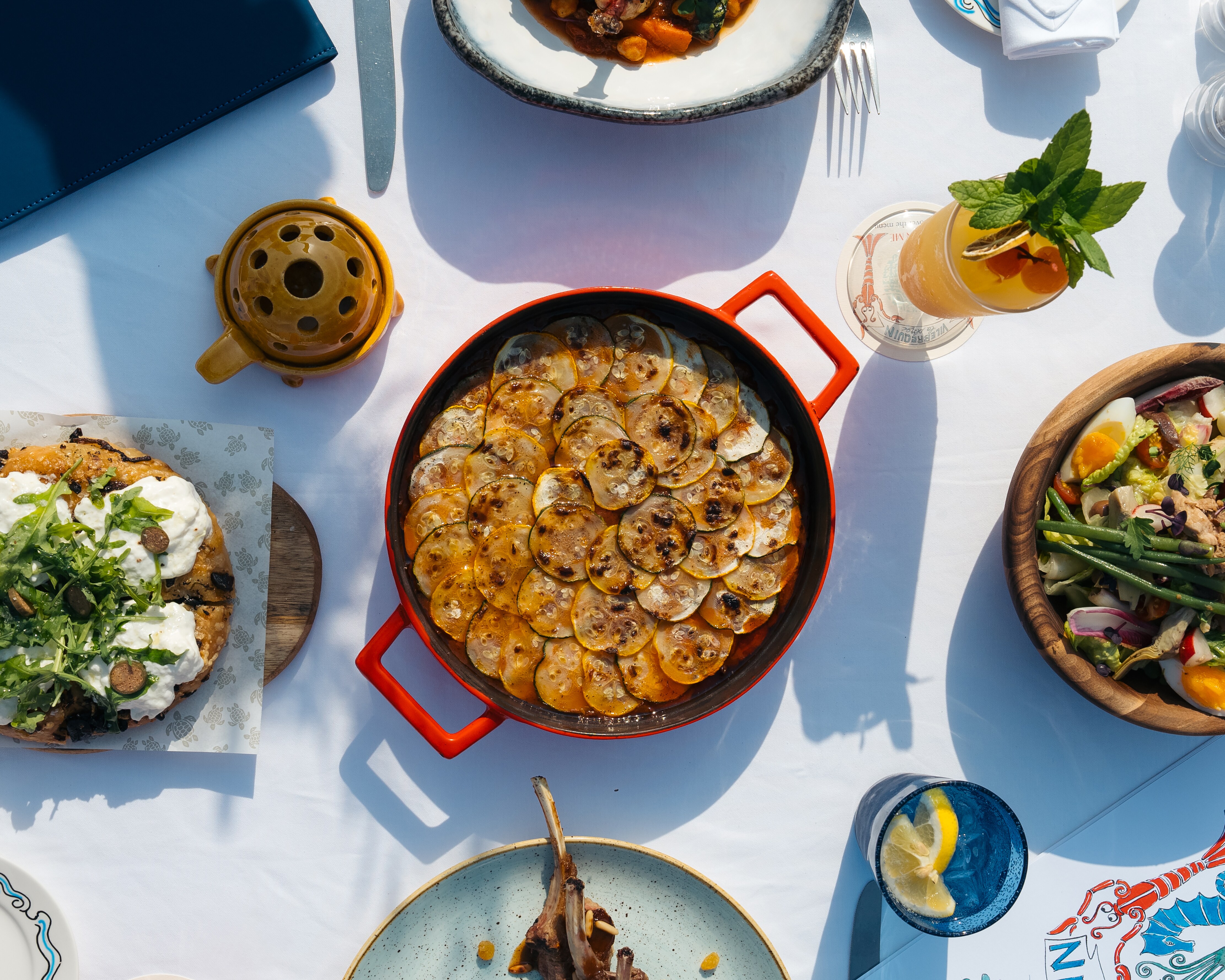 Pots of food on a table
