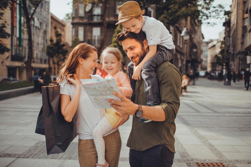 Family in King's Cross looking at map