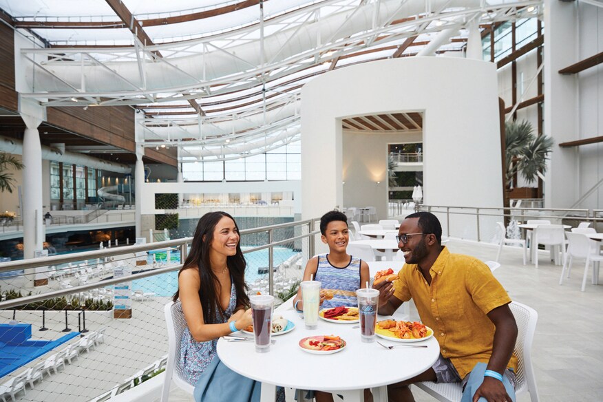 Family eating near pools