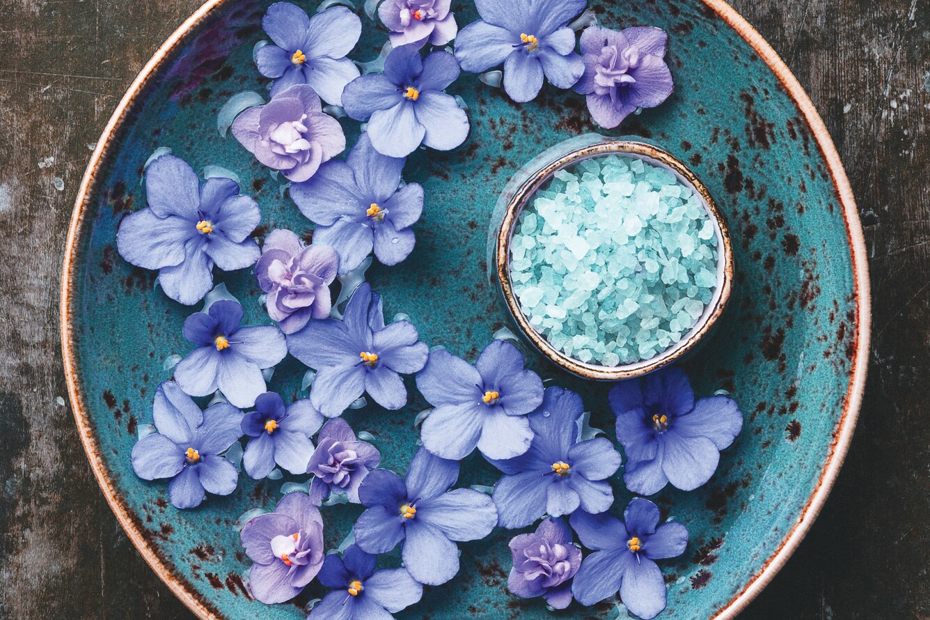 Bowl with flowers and salt.