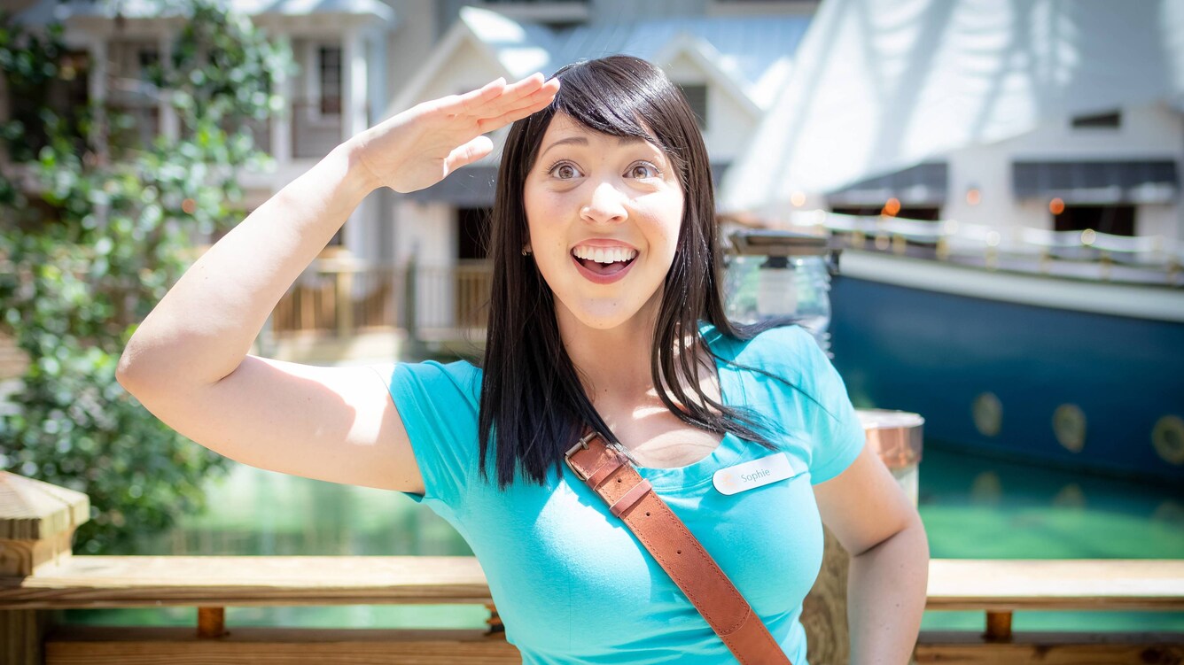 Sophie from Adventure Kids smiling and saluting