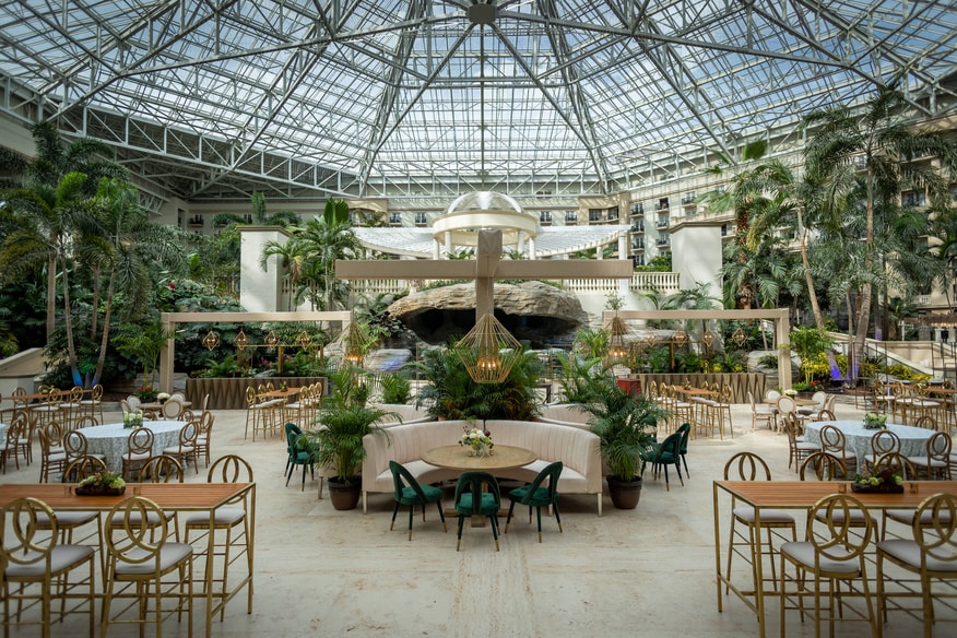Emerald Plaza inside the atrium, set up for an event with tables and chairs.