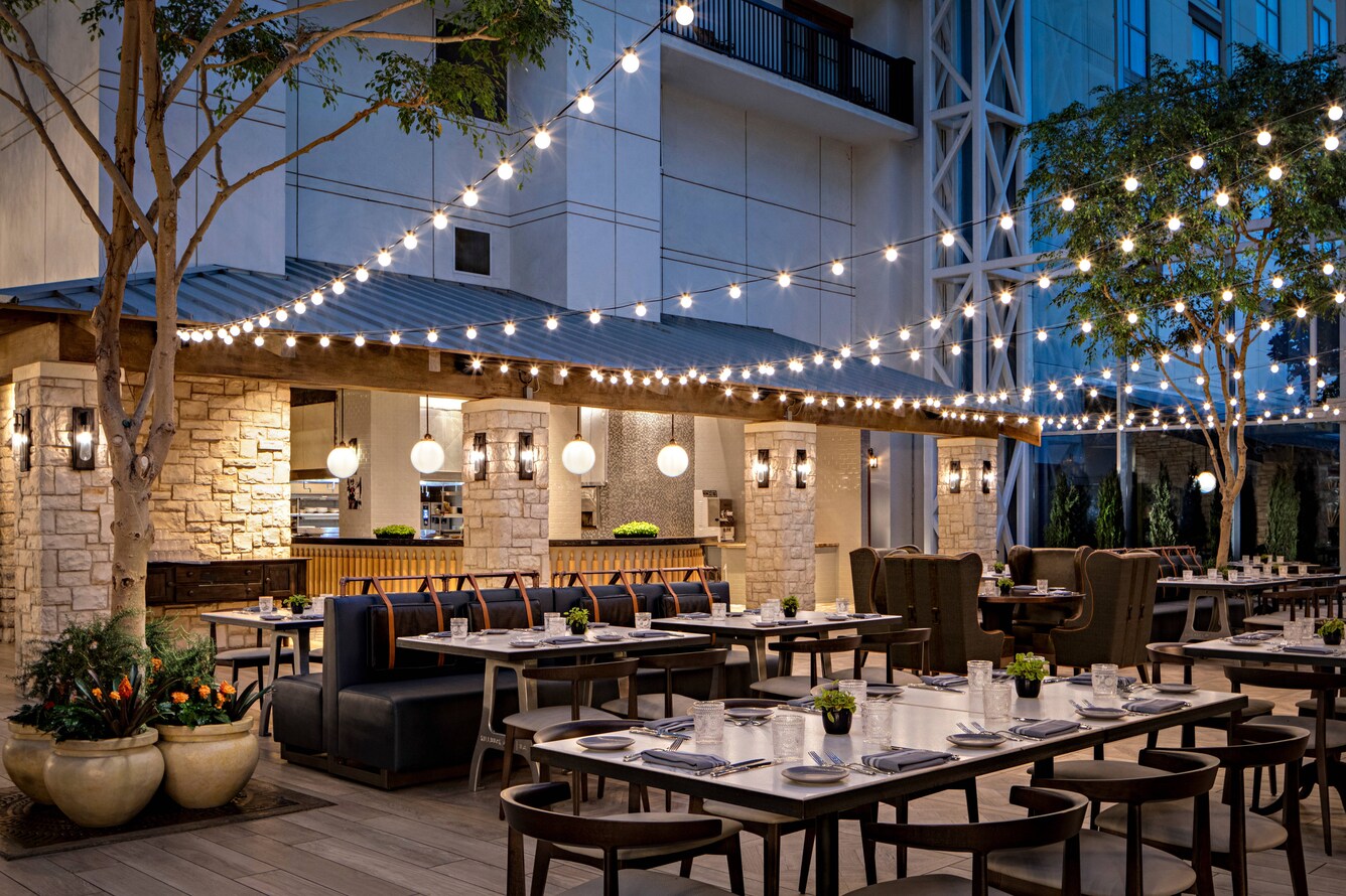 Restaurant patio seating with string lights