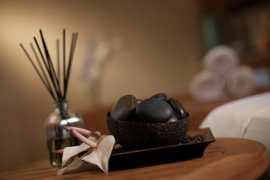 Spa hot stones and aromatherapy sticks spa detail and decor