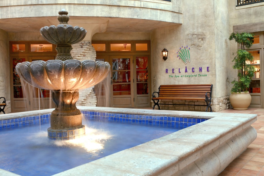 Exterior entrance view of relache spa and outdoor fountain