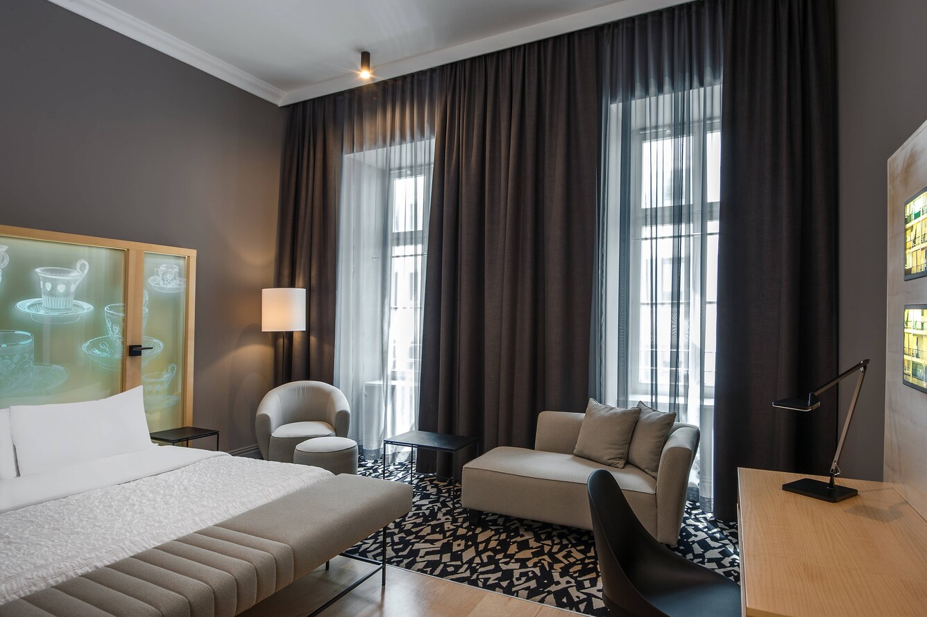 sitting area with windows in a guest rooms