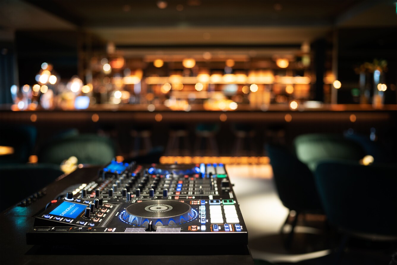 DJ table with view of bar in background