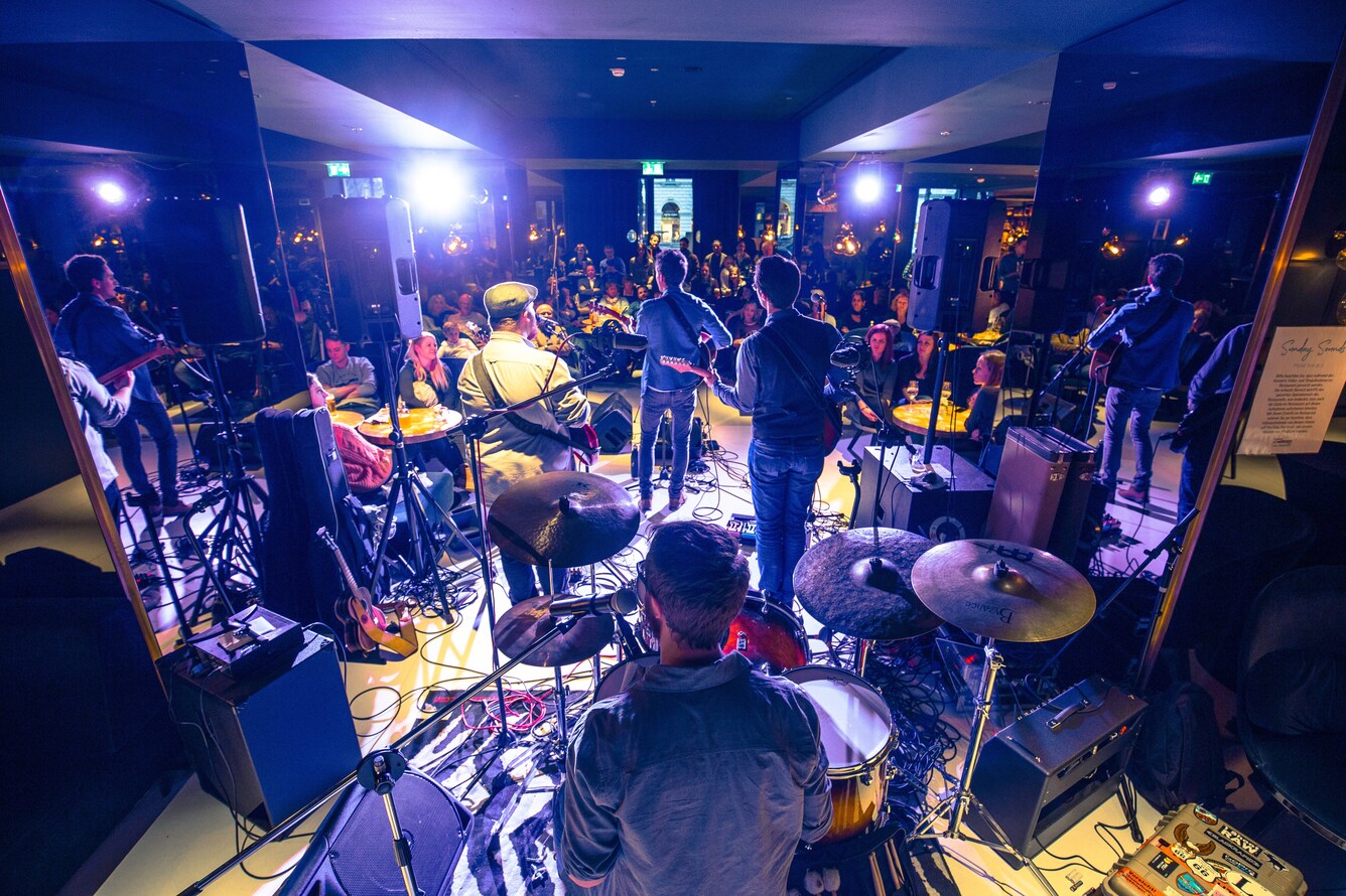 musician playing to an audience
