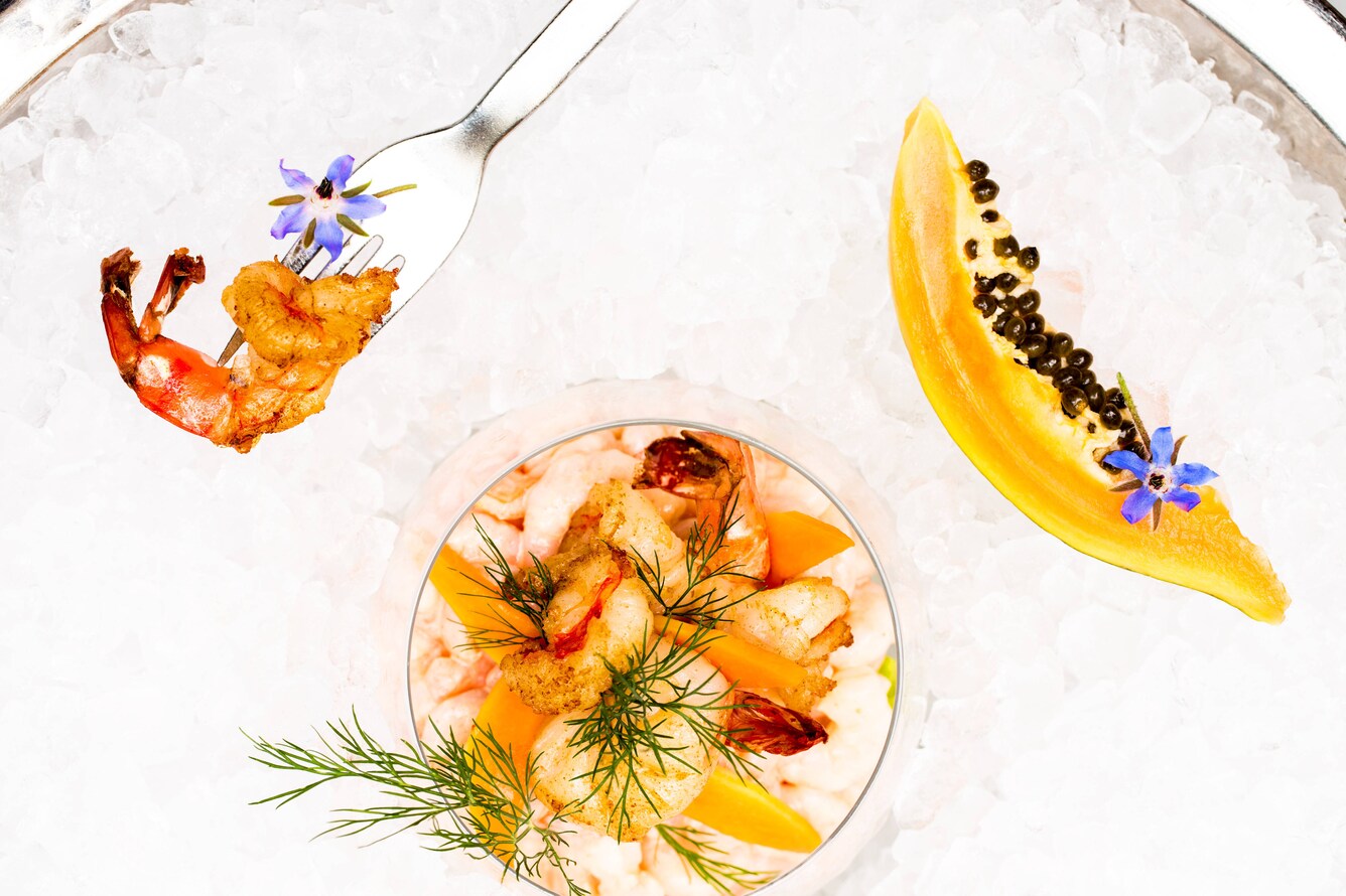 papaya and shrimp on ice