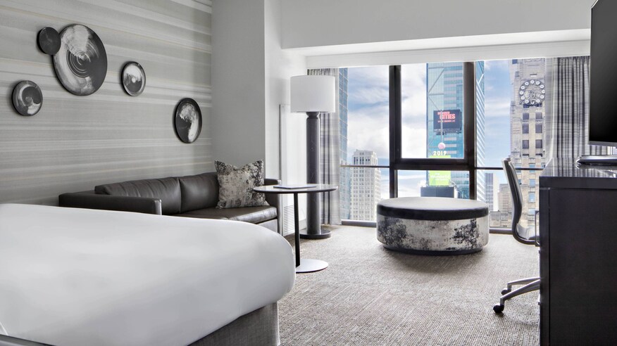 Guest room with bed and sofa