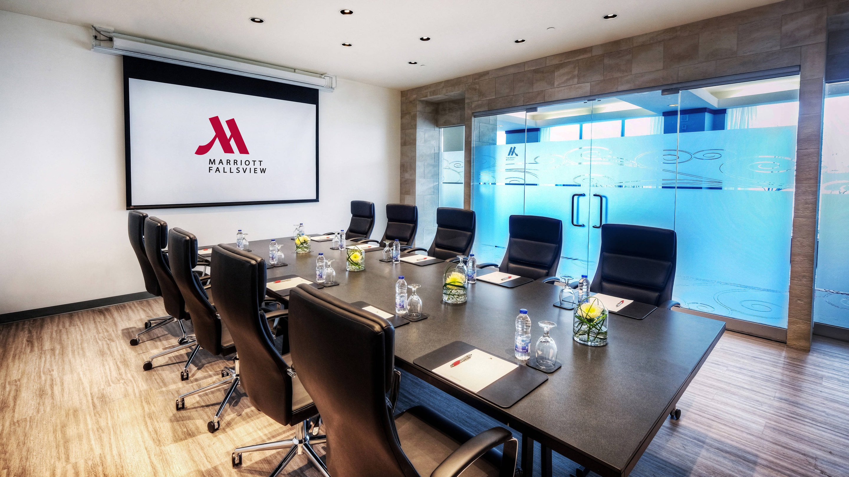 boardroom with long table and chairs