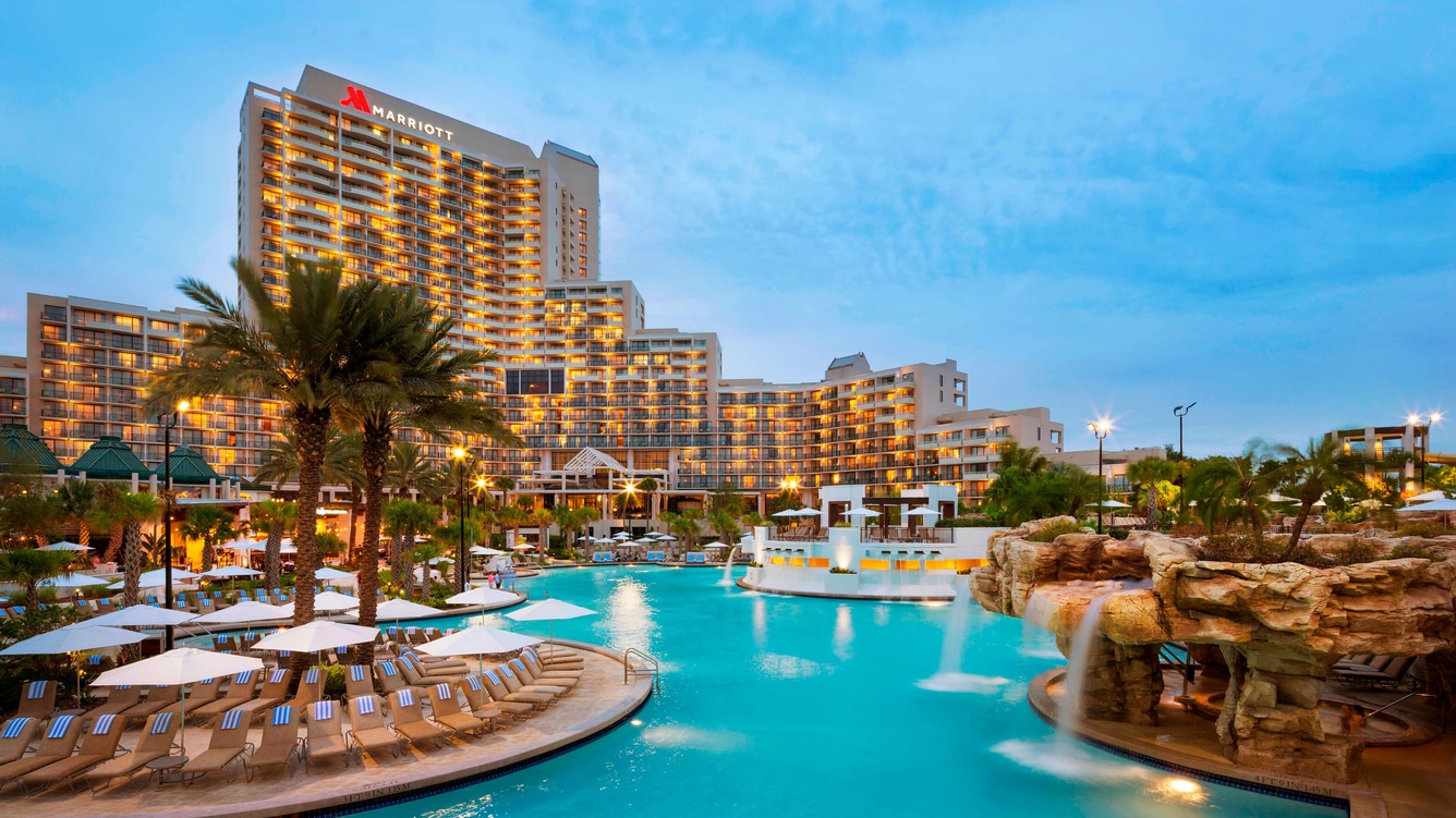 view of resort with lights on