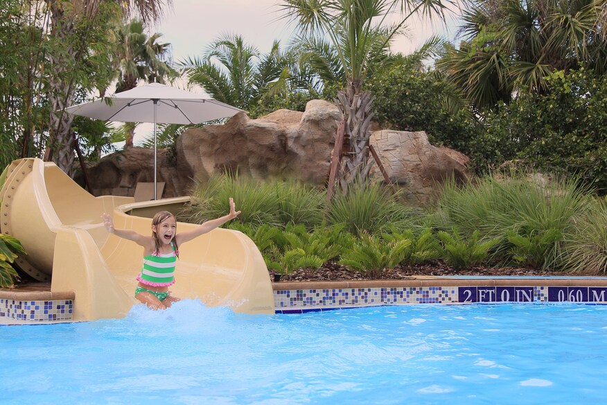 girl going down slide