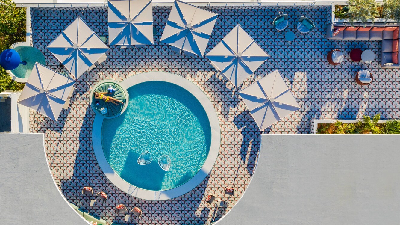 Miami beach rooftoop lounge with Lilli pad day bed and lounge pool.
