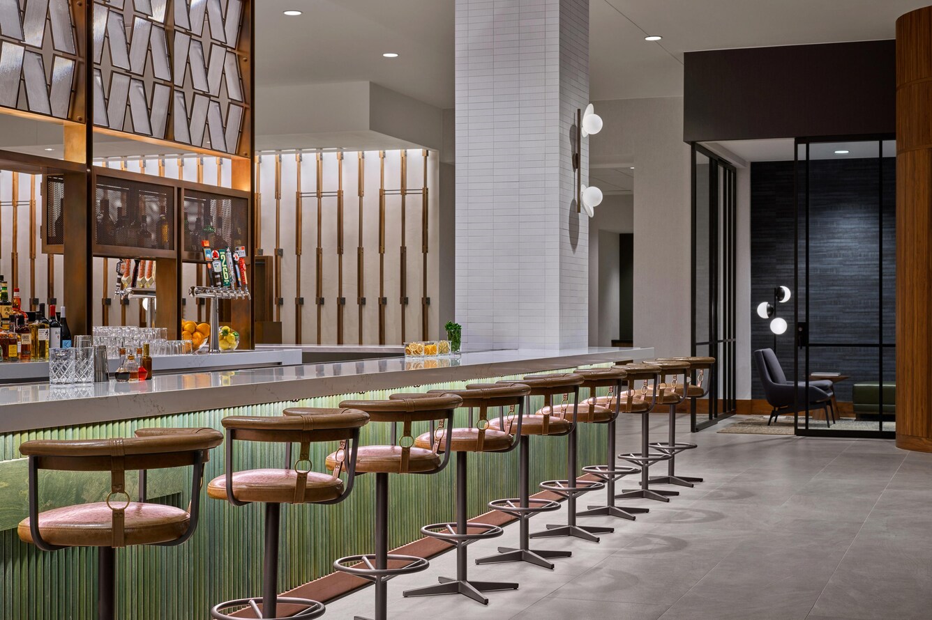 Coffee commons bar seating and liquor display
