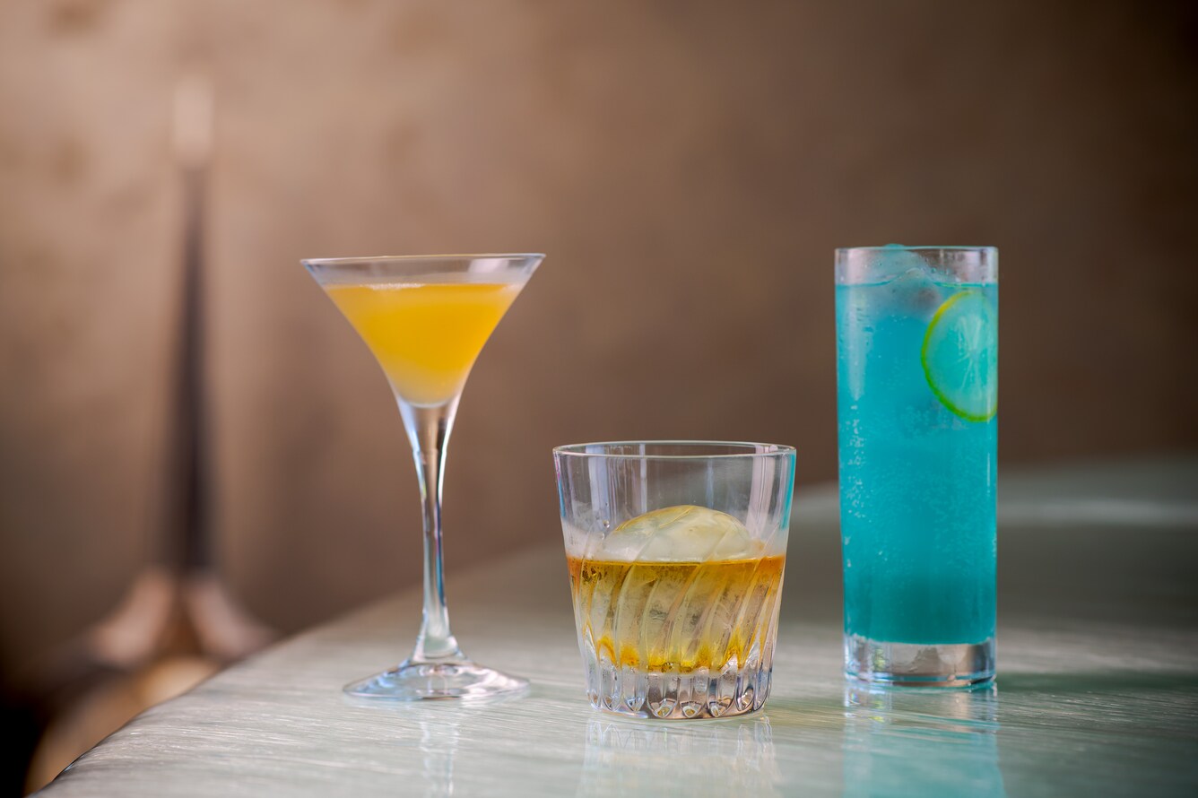 Yellow and blue specialty cocktails and drinks