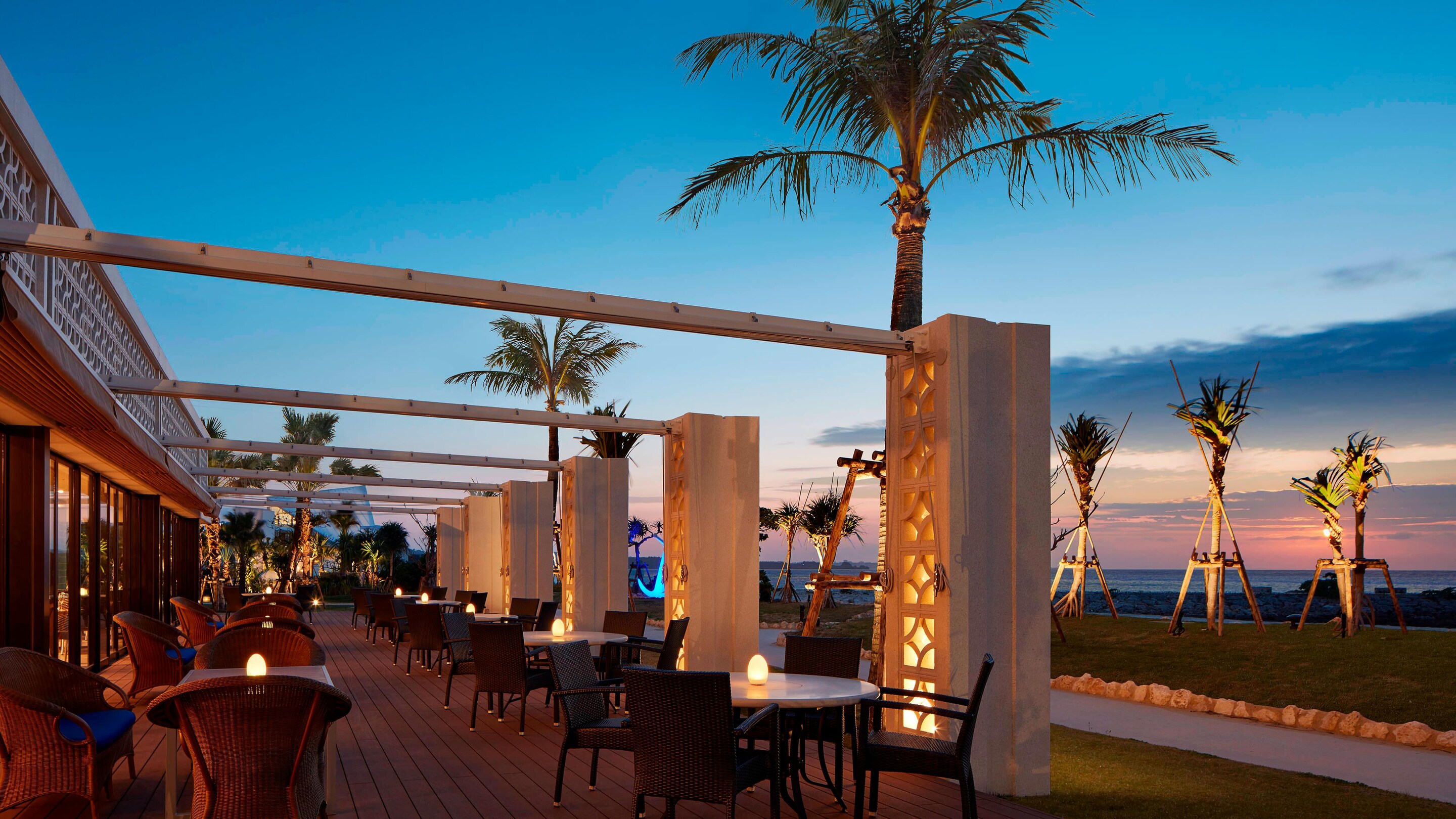 The grill terrace seating and evening sunset