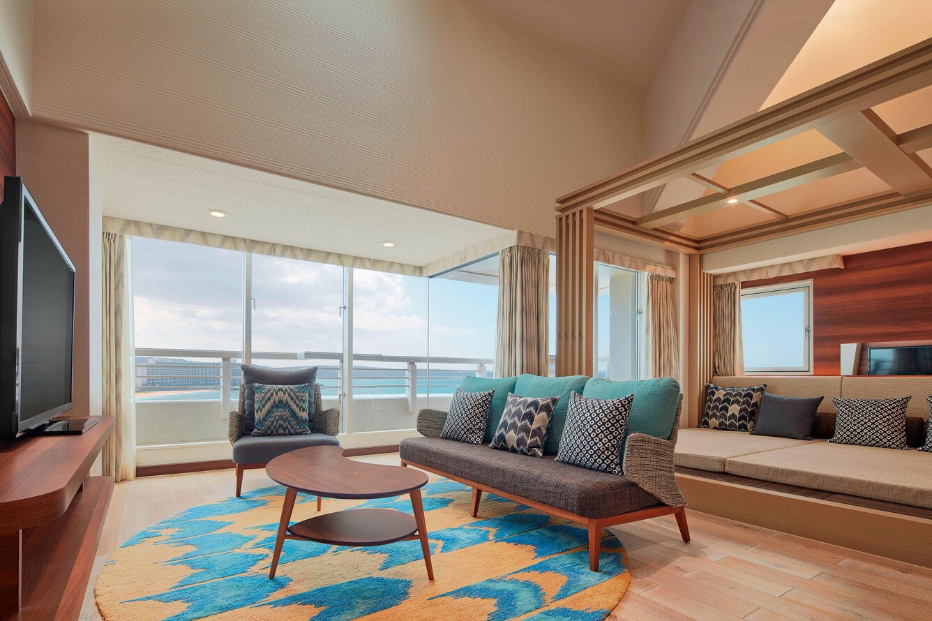 Ocean suite living area with seating and ocean view