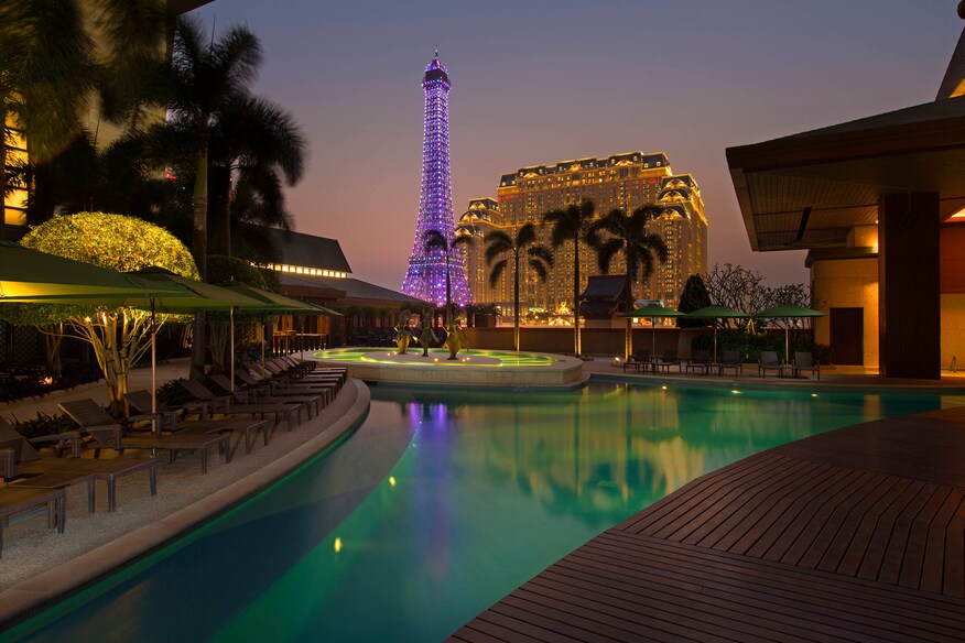 View of eiffel tower from pool on upper floor