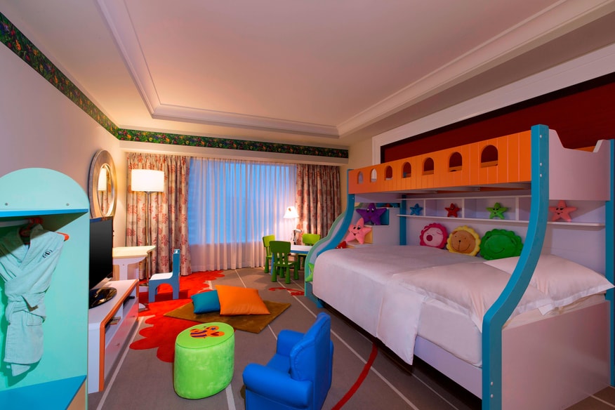 Family suite kid's room with bunk beds and kid furniture
