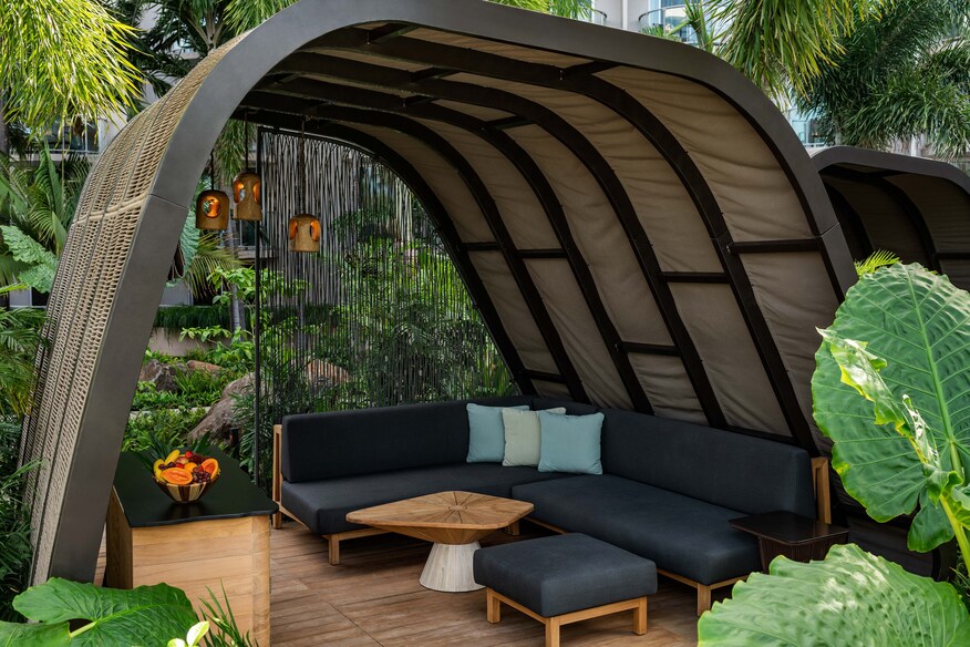 Bamboo and dark wood beach cabana.