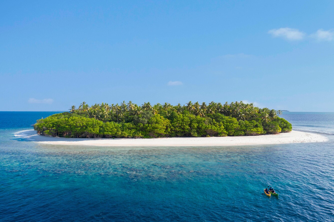 Kayakers approaching small island