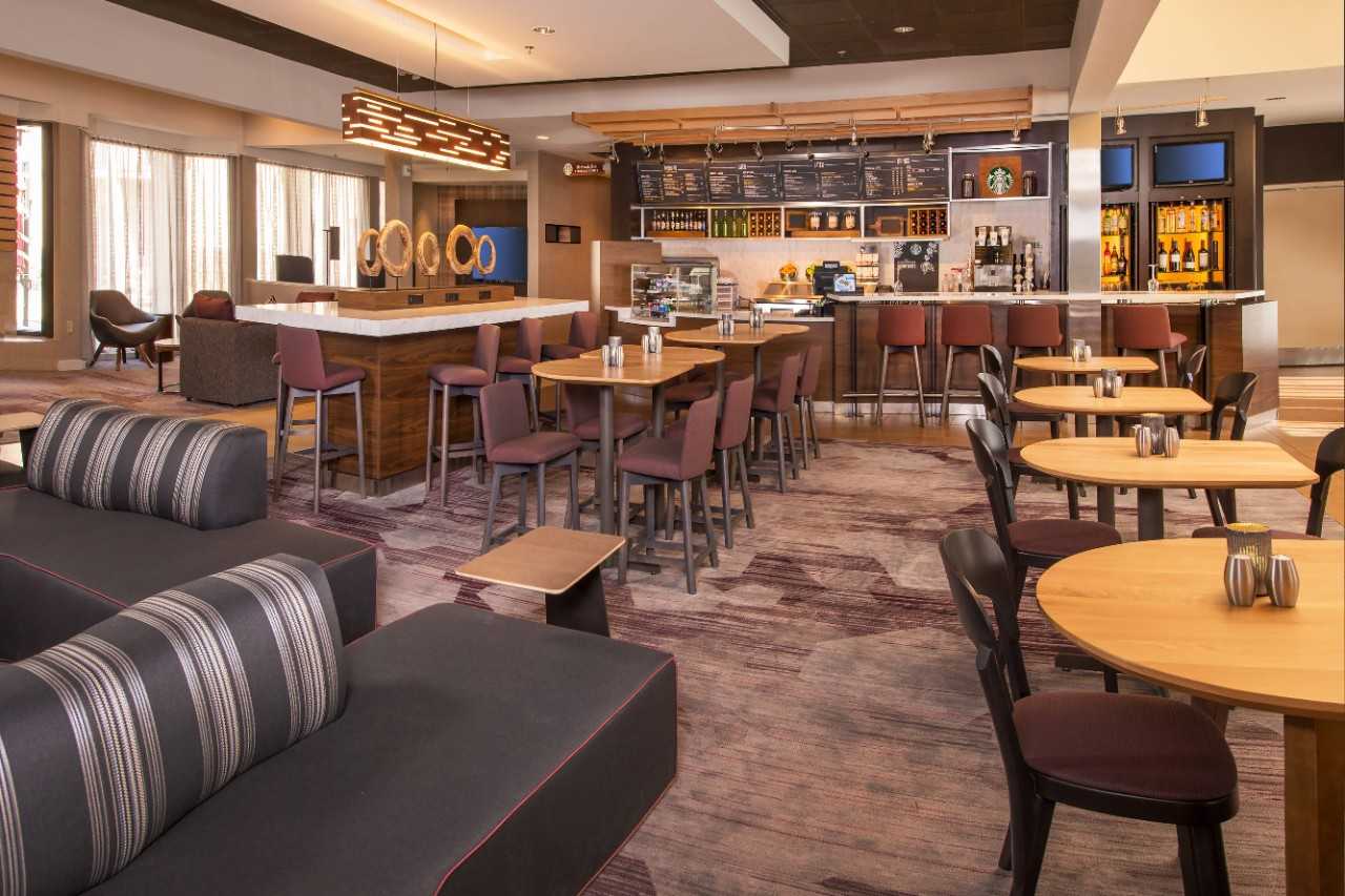 Bistro seating area with sofas and tables