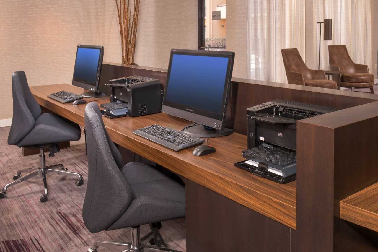 Hotel business center computers and desks