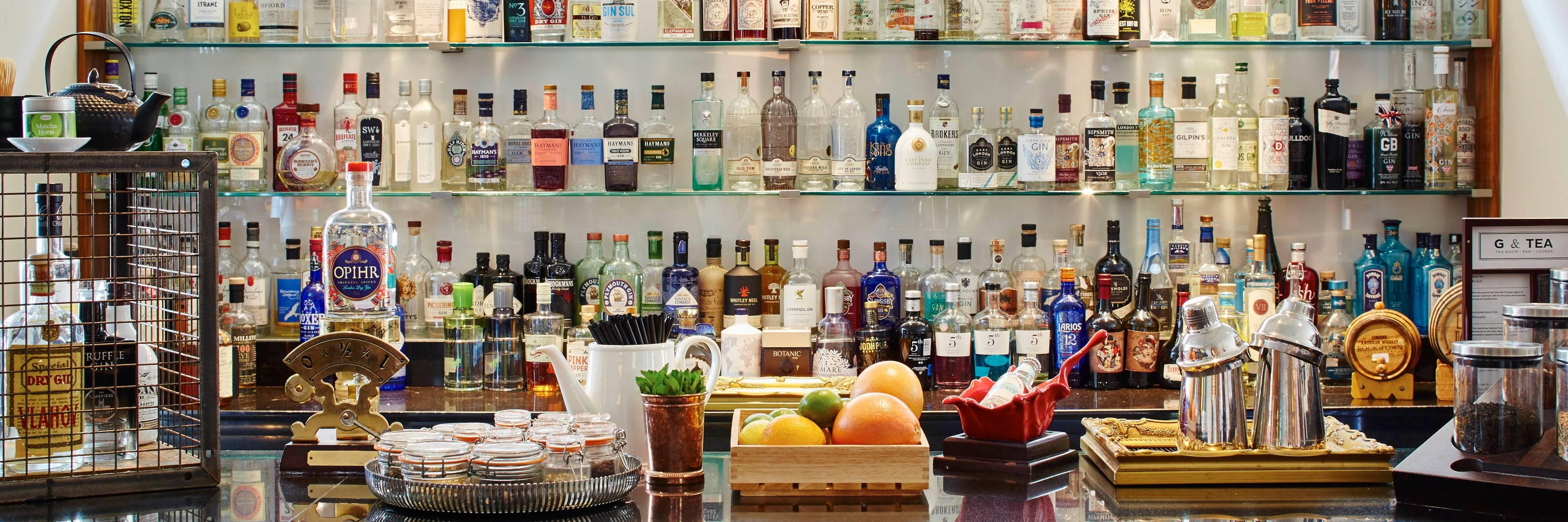 Wall of beverages at G&Tea lounge.
